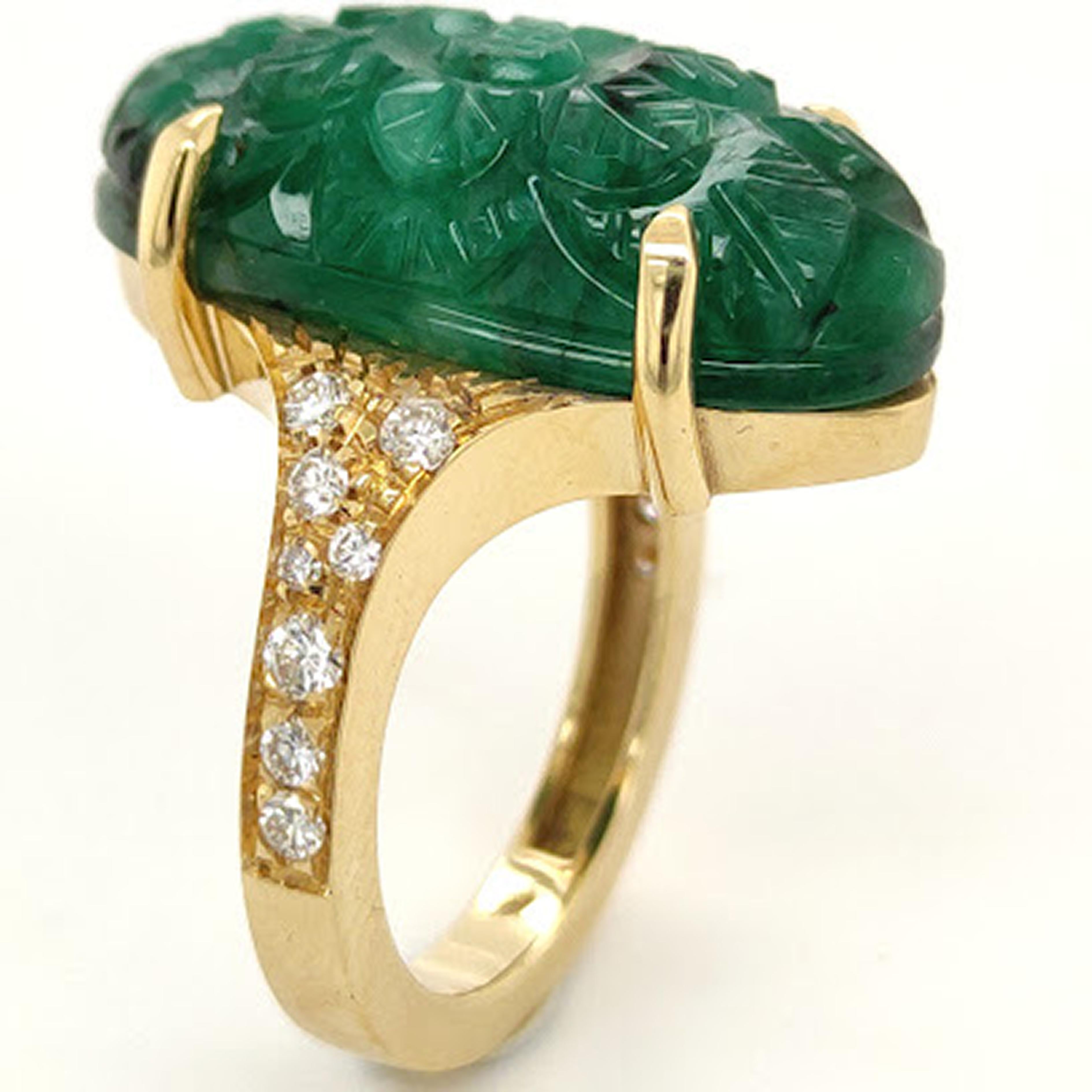 One-of-a-kind, Contemporary, Unique yet Chic Cocktail Ring Featuring a 16.38 Carat Natural Hand Engraved Emerald Cabochon (0.942x0.480in) in a 0.60Kt Top Quality White Diamond Setting.
The color-changing of the Emerald cabochon combined with White