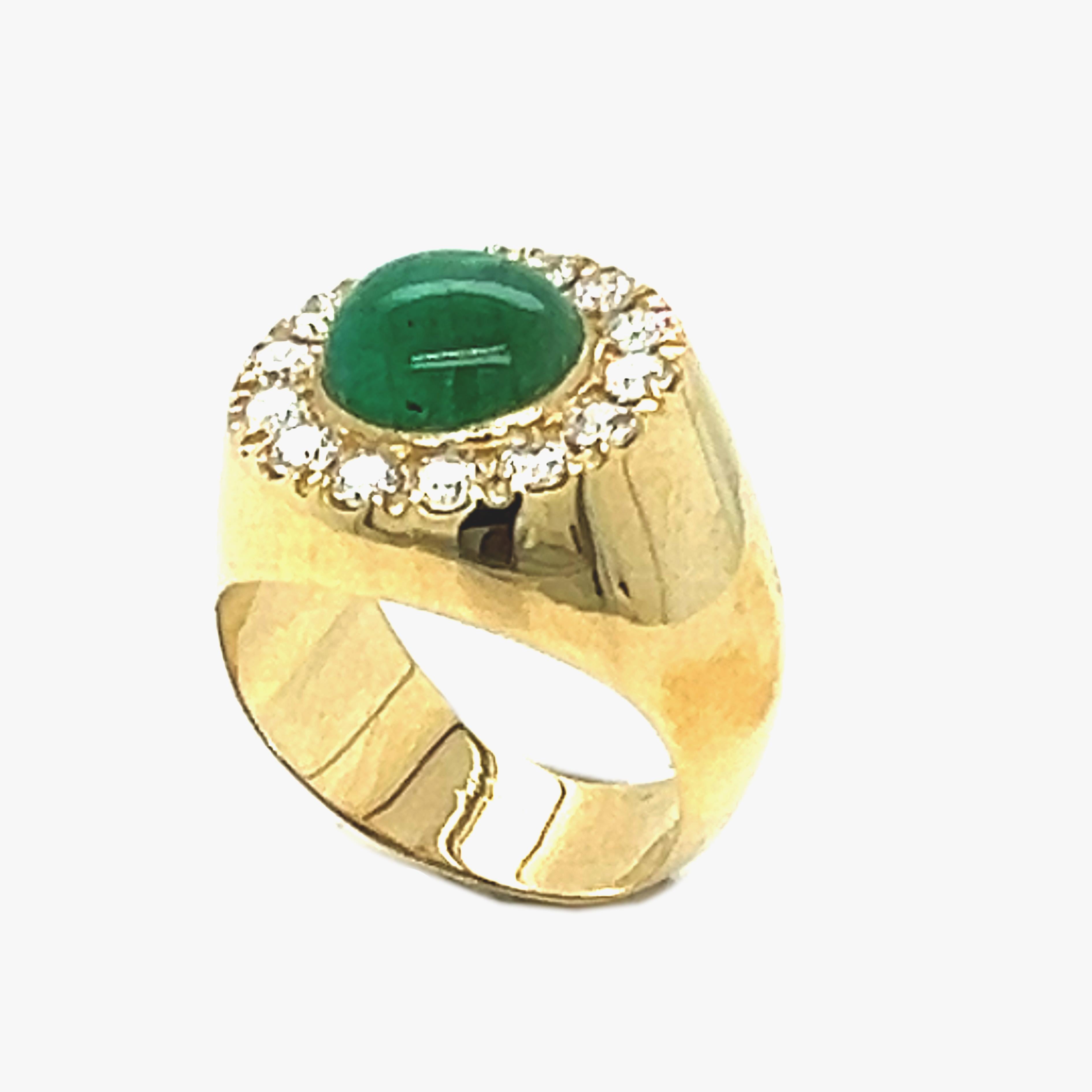 Chic, Unique yet Timeless Contemporary Cocktail Ring featuring a 2.09Kt Natural Emerald Round Cabochon surrounded by 0.89Kt Top Quality White Diamond in an elegant Yellow Gold Setting, perfect as a cocktail ring as well as a pinkie: a Stunning,