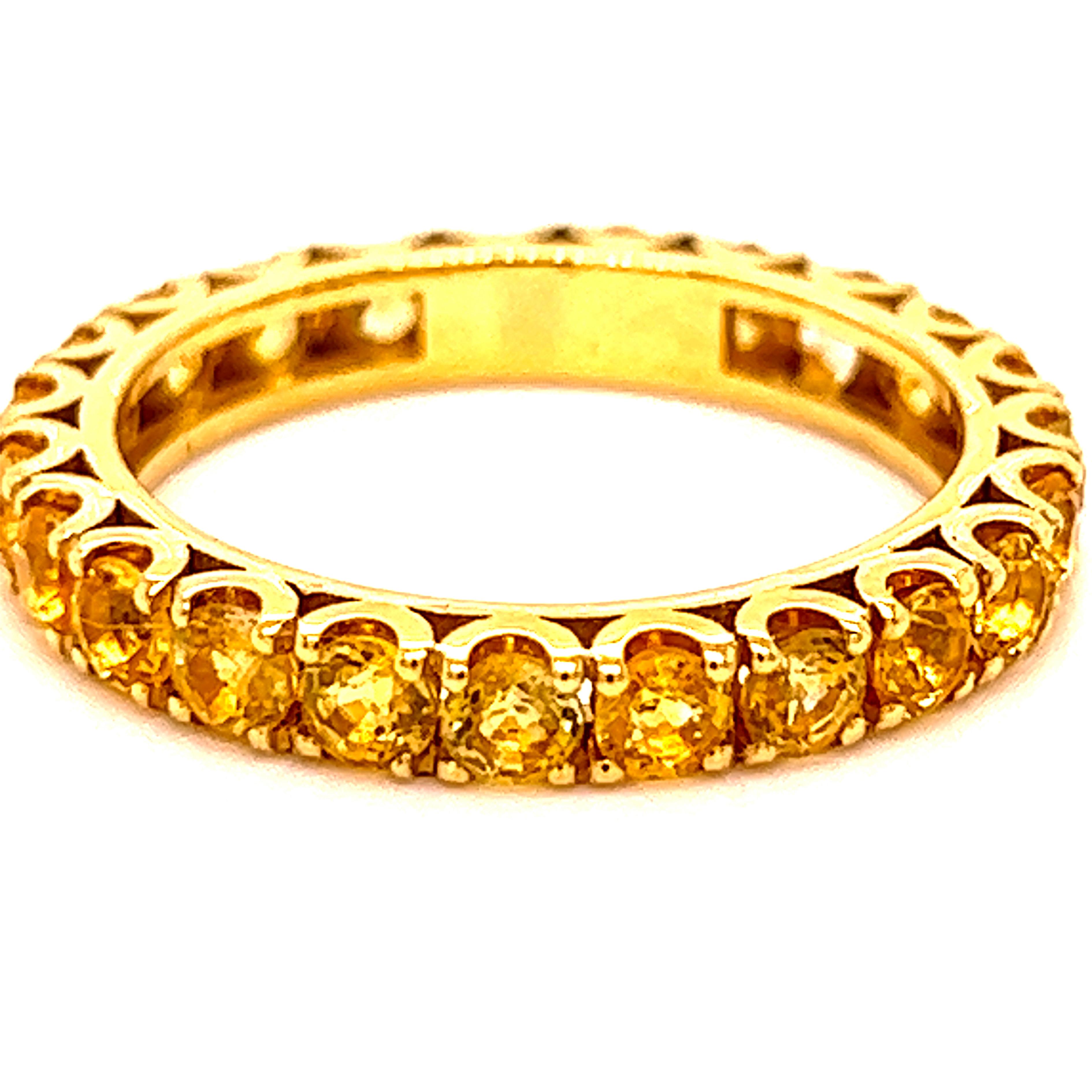 Beautifully hand crafted Eternity Band featuring 24 round brilliant cut Natural Yellow Sapphire for a total weight of 2.93Carat in an 18Kt Yellow Gold fish tail setting.
US Size 6 1/2
French Size 53
In our fitted dark brown suede leather and
