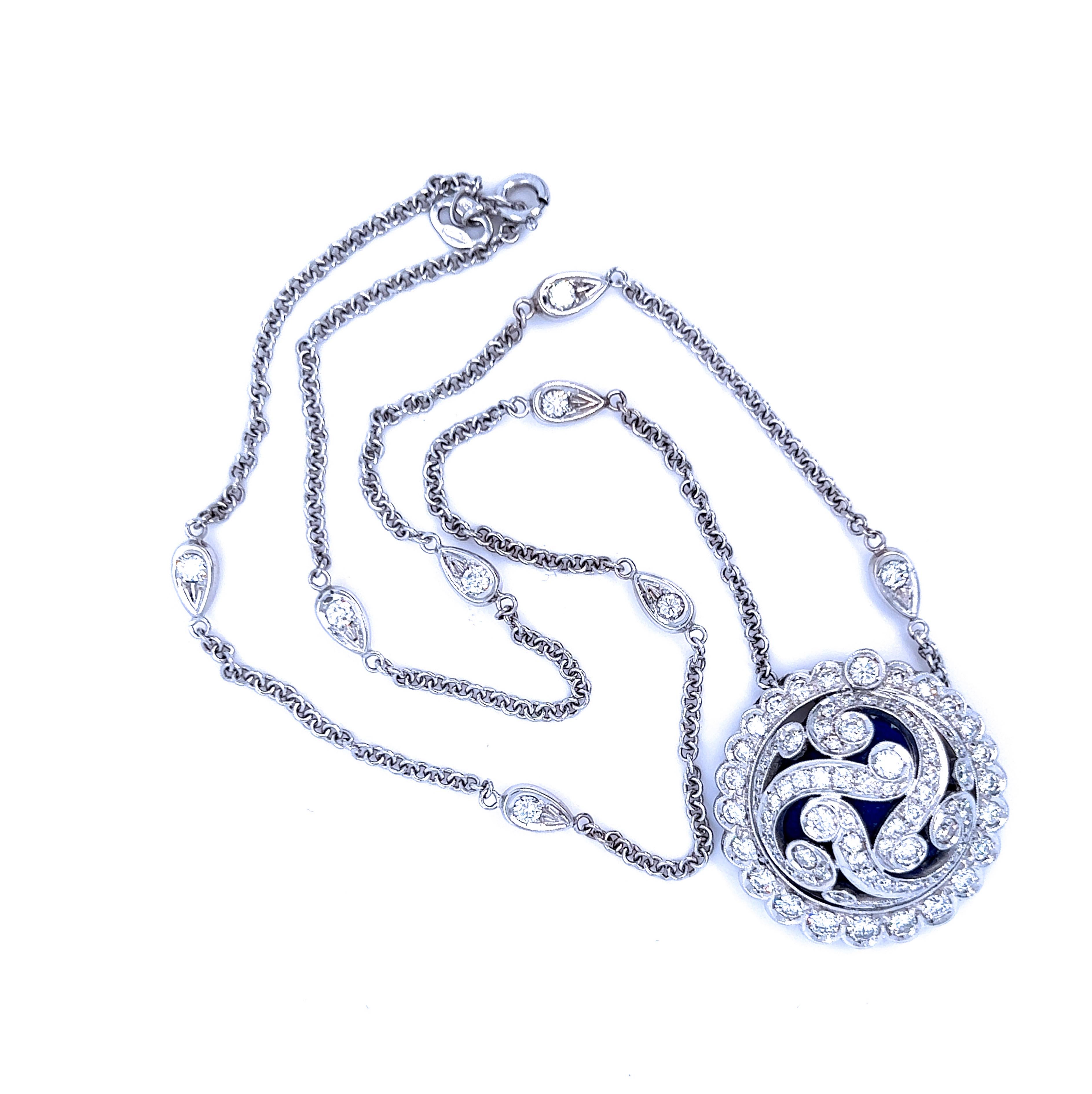 One-of-a-kind  piece, pure, timeless, Art Deco style. 
The hand enameled Royal Blue cabochon meets the extra white of top quality brilliant cut diamond: 2.80Kt (D-E, VVs1) White Diamond in an 18Kt White Gold setting.
In our smart fitted tobacco