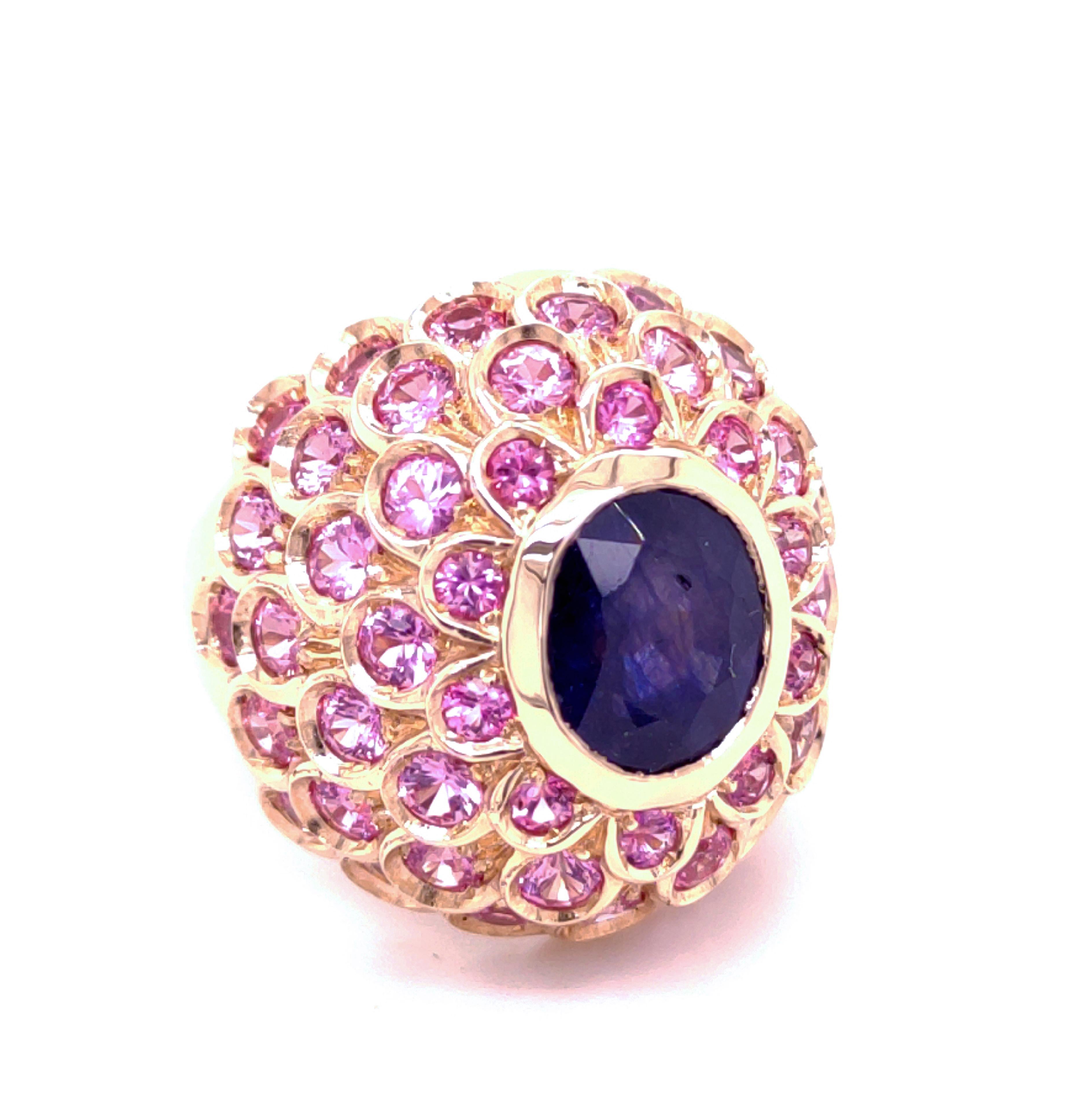 One-of-a-kind, Sumptuous, Unique yet Timeless Cocktail Ring Featuring 3.72kt Natural Oval Cut Blue Sapphire in a Rose Gold 4,32kt Brilliant Cut Pink Sapphire Setting.
Absolutely perfect to wear also as unique pinkie ring. 
In Our Fitted Dark Brown