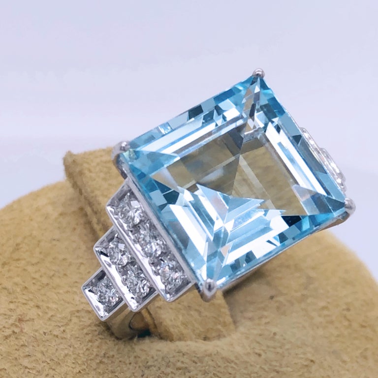 One-of-a-kind 7.99 Carat Princess Cut Natural Brazilian Aquamarine(0.474in lenght 0.474in width, 12x12mm) in a Chic yet Timeless 0.48Kt Top Quality White Diamond 18Kt White Gold Setting.
US size 6
French size 52
A detailed gemological certificate