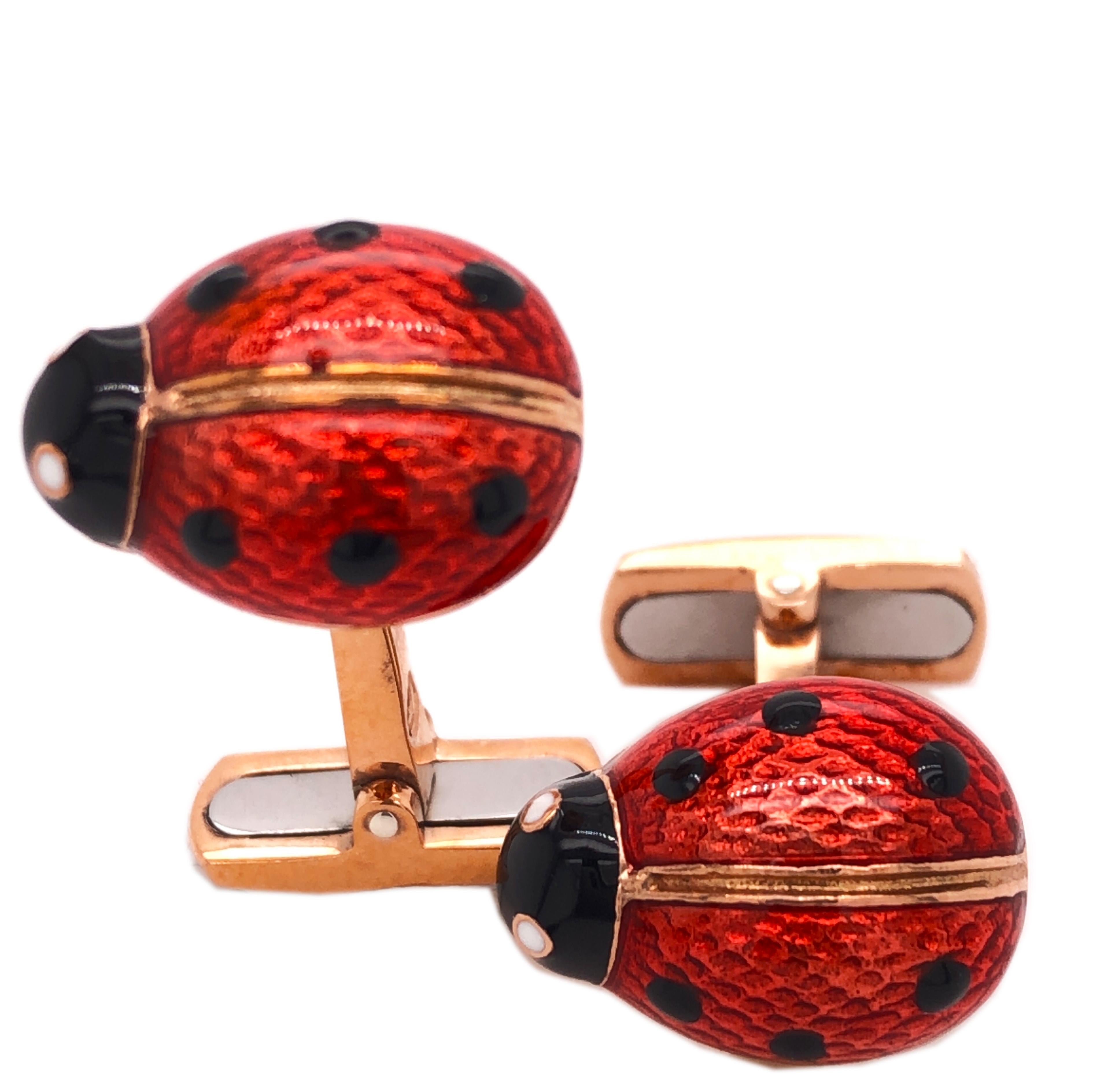Chic, Timeless, but not Traditional Red Black Spotted Hand Enameled Little Ladybug Shaped  T-Bar Back, Rose Gold Setting Cufflinks.
In a smart Tobacco Leather Case and Pouch.



