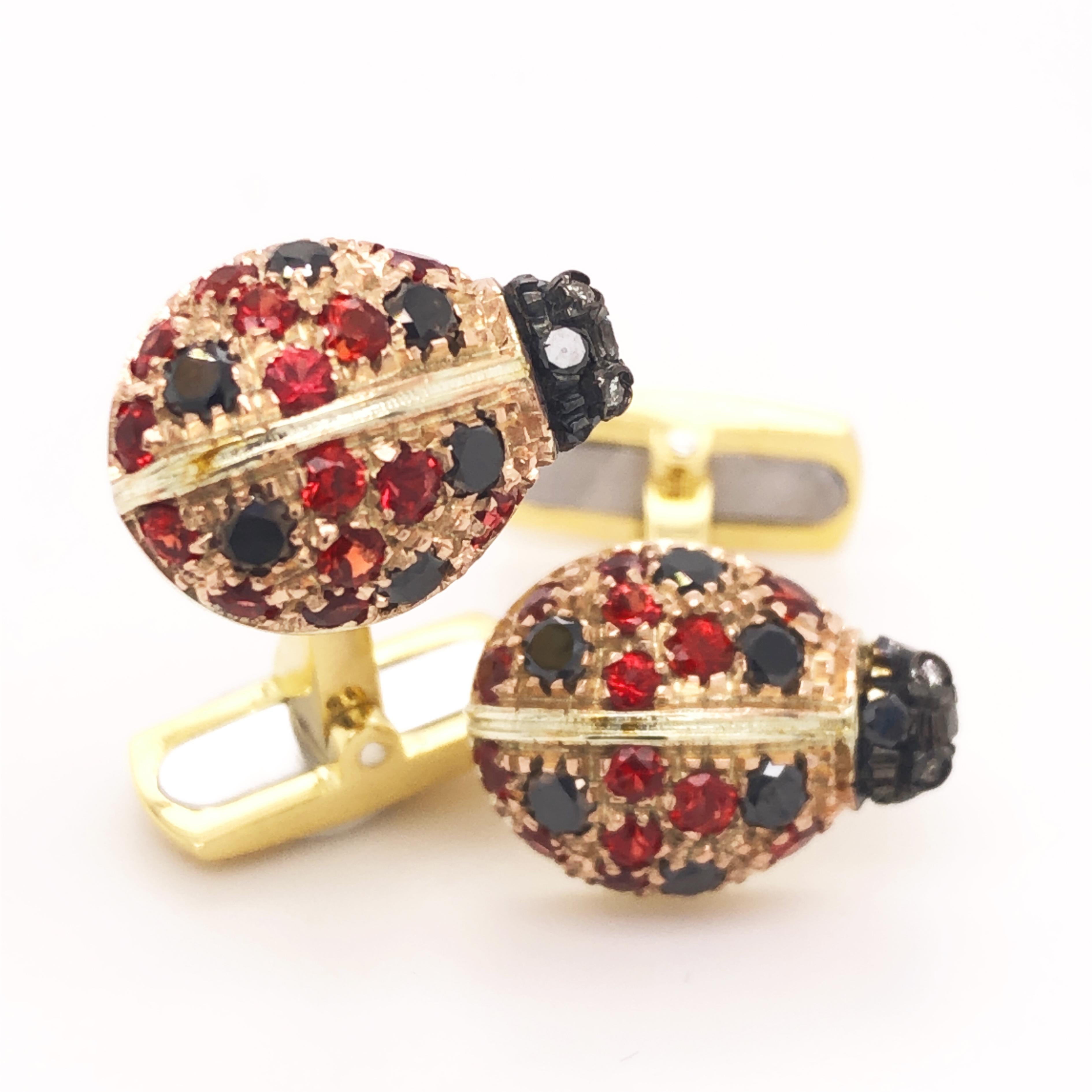 Chic and Unique, Smart yet not Traditional 0.75Kt Black, 0.03Kt White Diamond, 1.10kt Ruby Little Ladybug Shaped T-Bar Back, 18K Rose and Yellow Gold Setting Cufflinks.
In our smart Tobacco Leather Case and Pouch.



