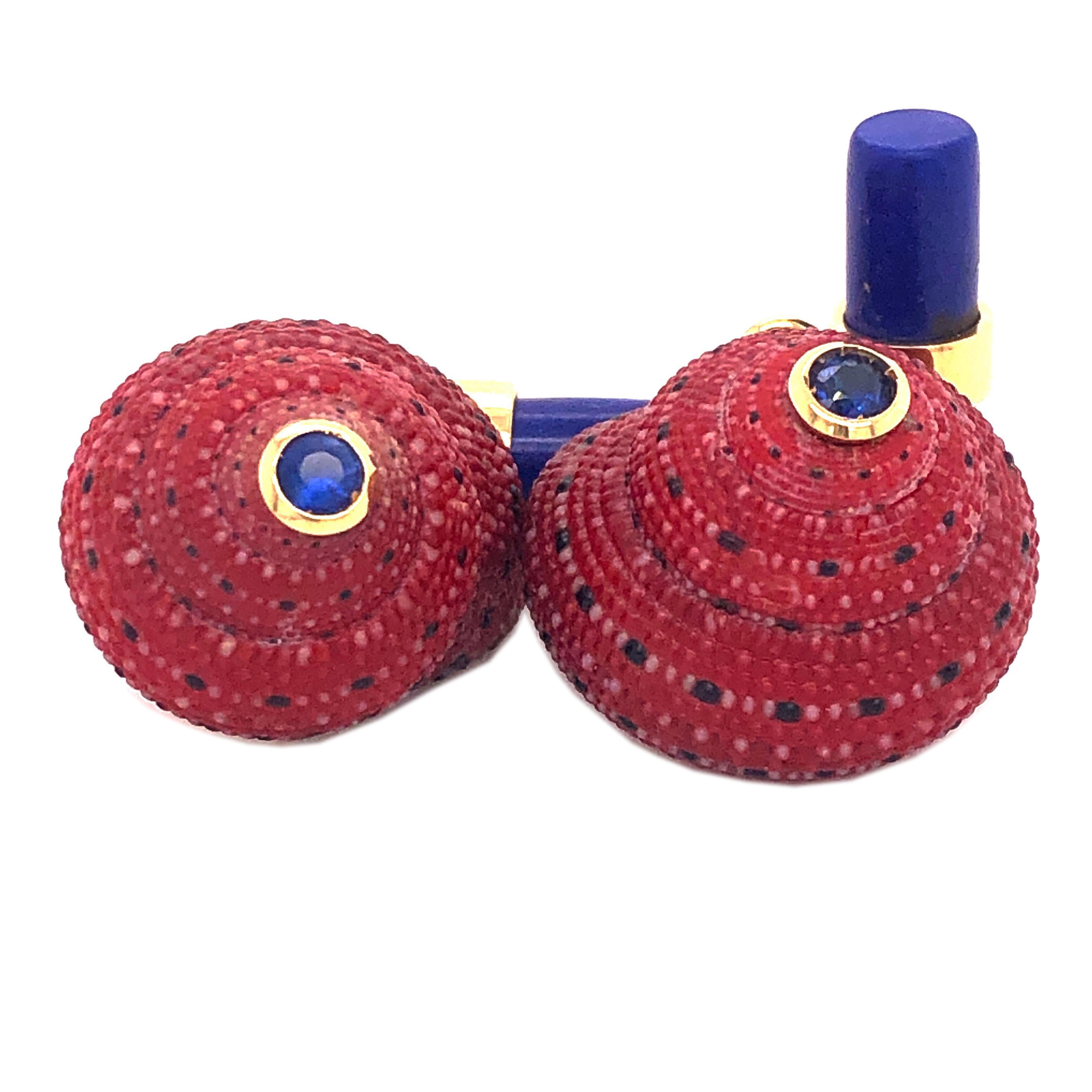 Unique and one-of-a-kind pair of cufflinks featuring 0.30Kt Natural Blue Brilliant Cut Sapphire in a Straberry Red Shell 18Kt Yellow Gold Setting. White Mother-of-Pearl Hand Enamel on the shell's back. A chic Hand Inlaid Natural Lapis-Lazuli baton