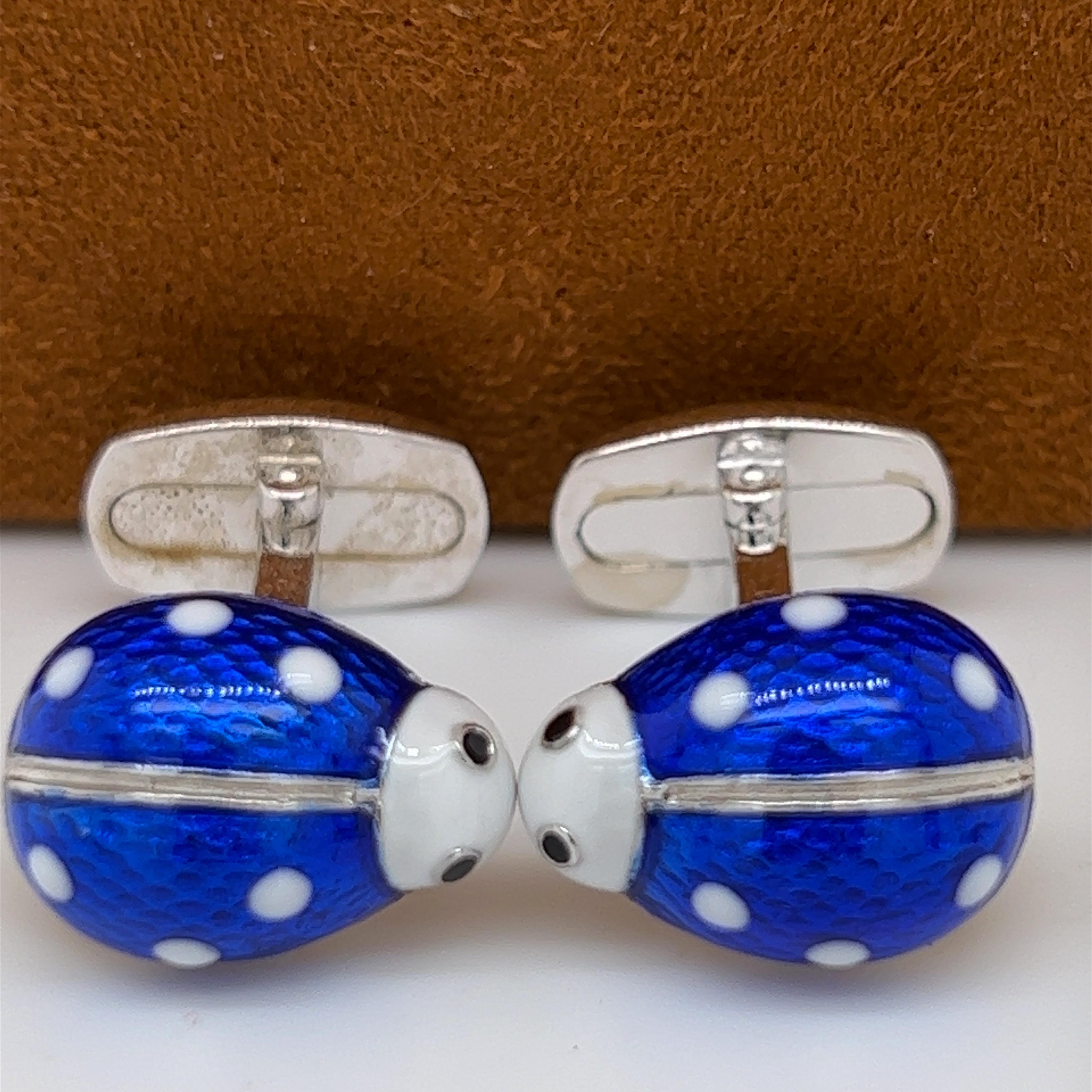 Chic White Dots and Royal Blue Hand Enameled Little Ladybug Shaped T-Bar Back, Sterling Silver Cufflinks.
In our smart tobacco leather case and pouch.


