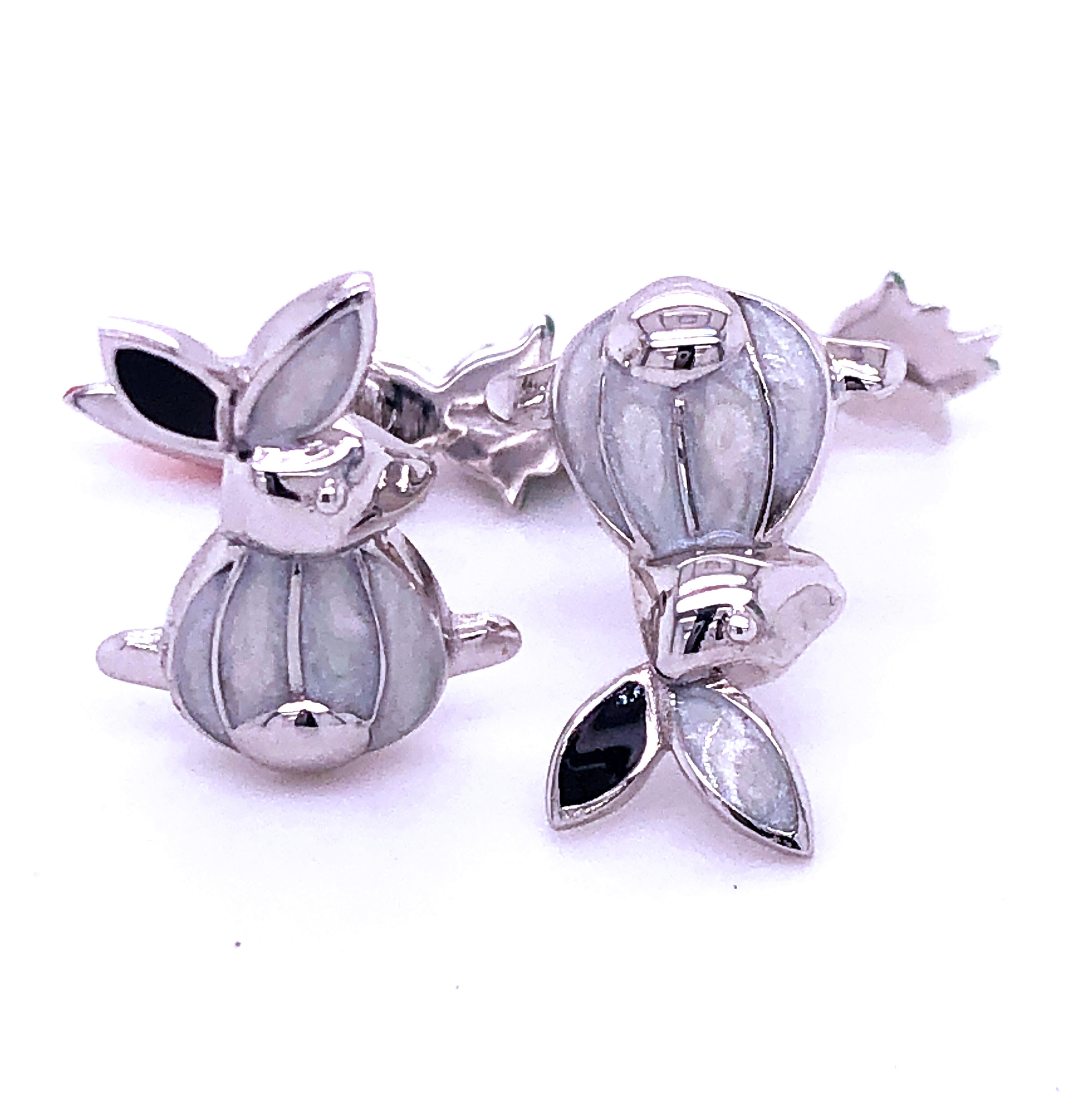 Hand Enameled Little Bunny Shaped Carrot Back, Unique yet absolutely Chic Sterling Silver Cufflinks.
In our smart Black Box and Pouch.



