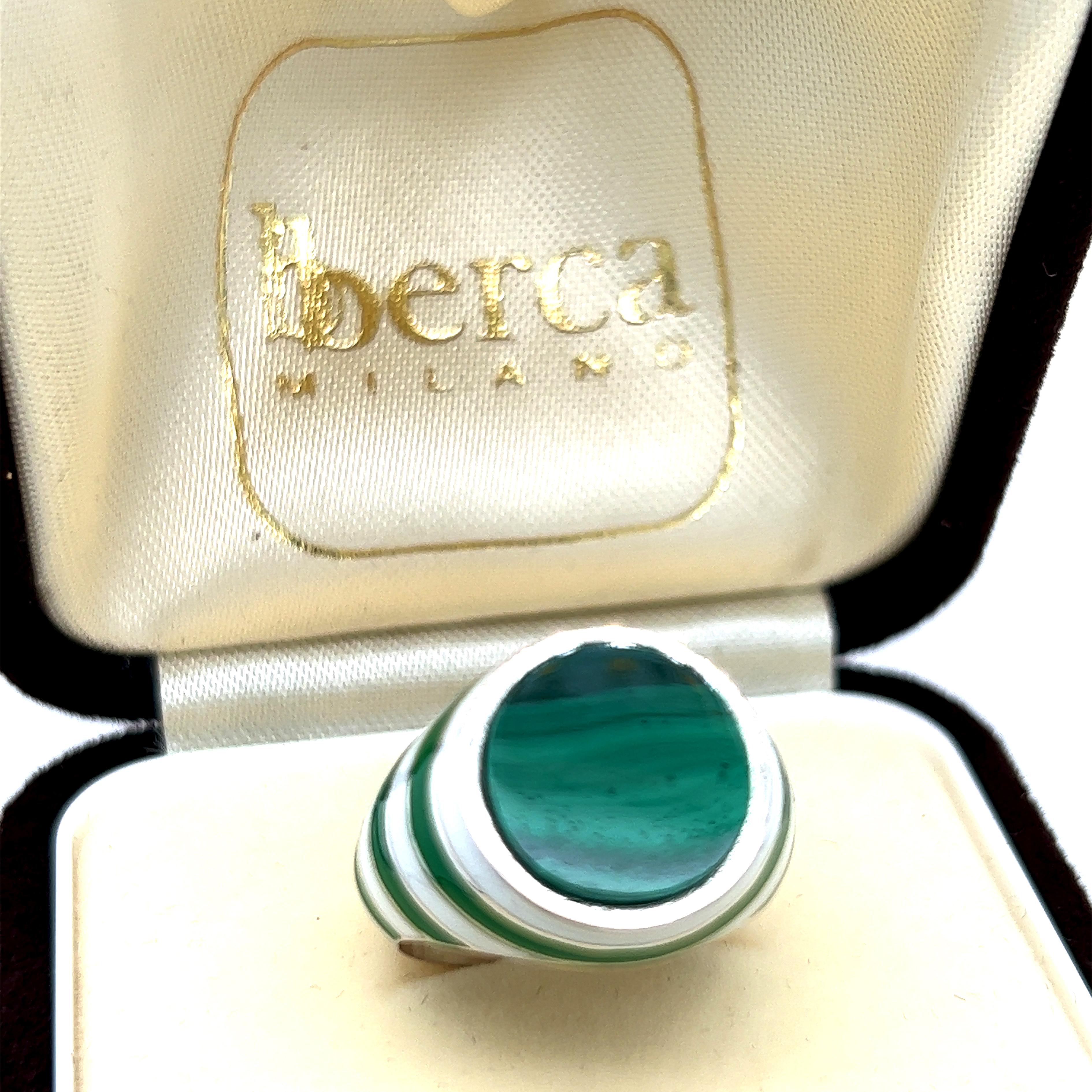 Contemporary, Chic yet Unique Cocktail Ring featuring a round natural Malachite disk in a white and green  hand enameled stripes motif in a solid sterling silver setting. Perfect to wear as signet ring on the pinkie.
In our smart Suede brown Box and