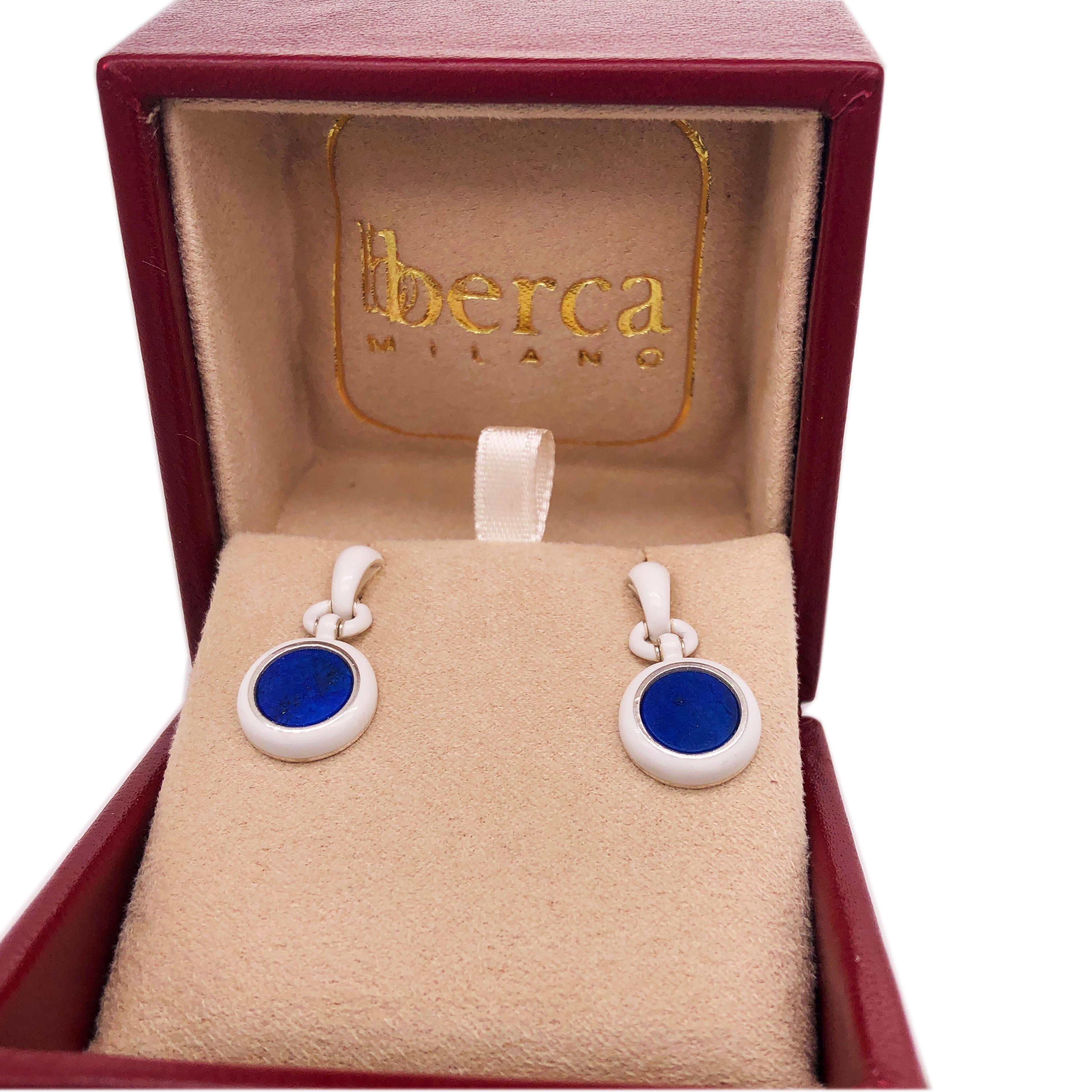 Chic yet Timeless Dangle Earrings Featuring 2.50Carat Natural Round Lapis Disk in a White Hand Enameled Sterling Silver Setting.
In our Precious Handcrafted tobacco suede Leather Box and pouch.


Total Lenght 1.34 inches