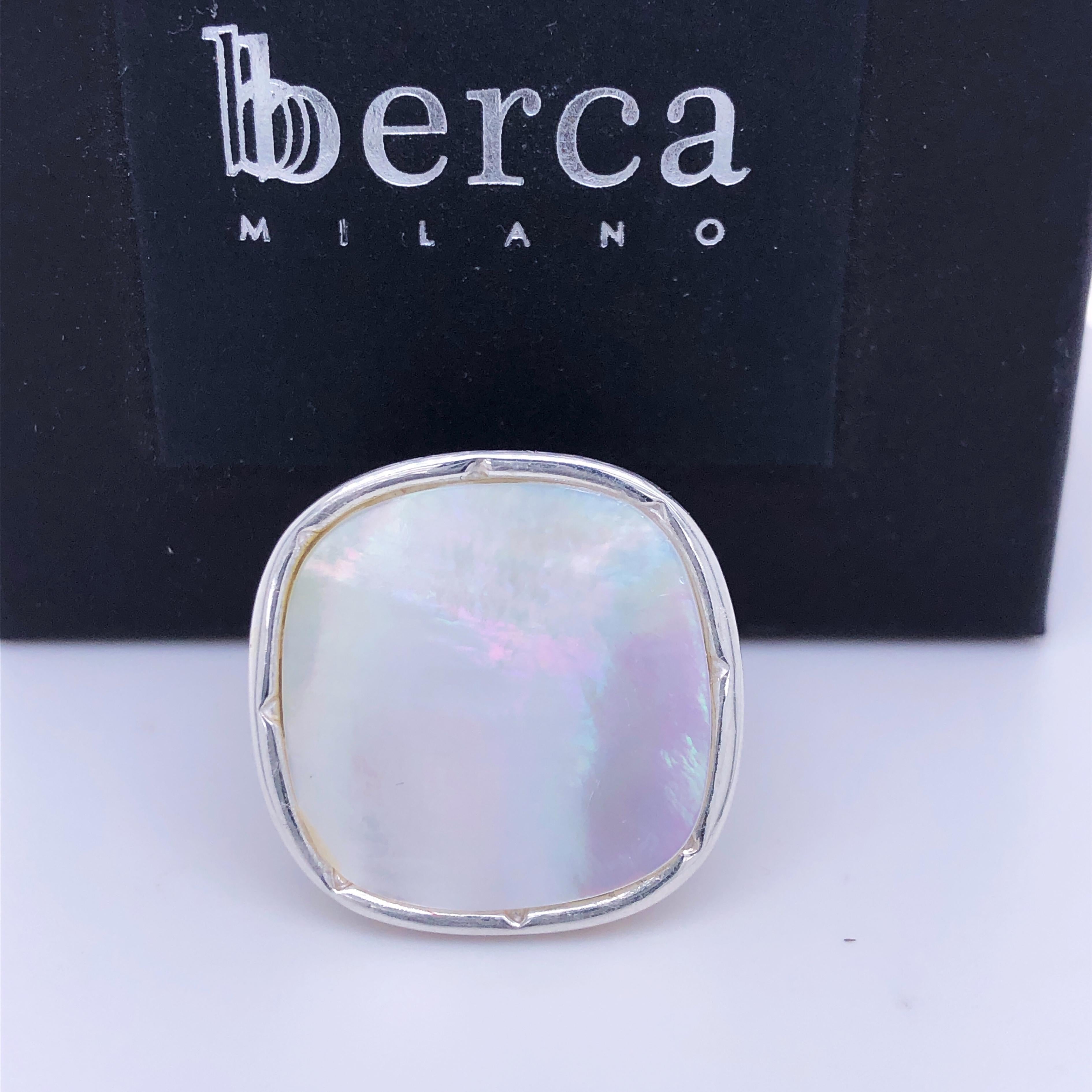 One-of-a-kind, Contemporary, Chic yet Timeless Cocktail Ring Featuring a Seven Carat Hand Inlaid Antik Cut Mother-of-pearl(0.850x0.850in) in a beautifully Handcrafted Hand Engraved Solid Sterling Silver Setting.
The color-changing of Mother-of-pearl