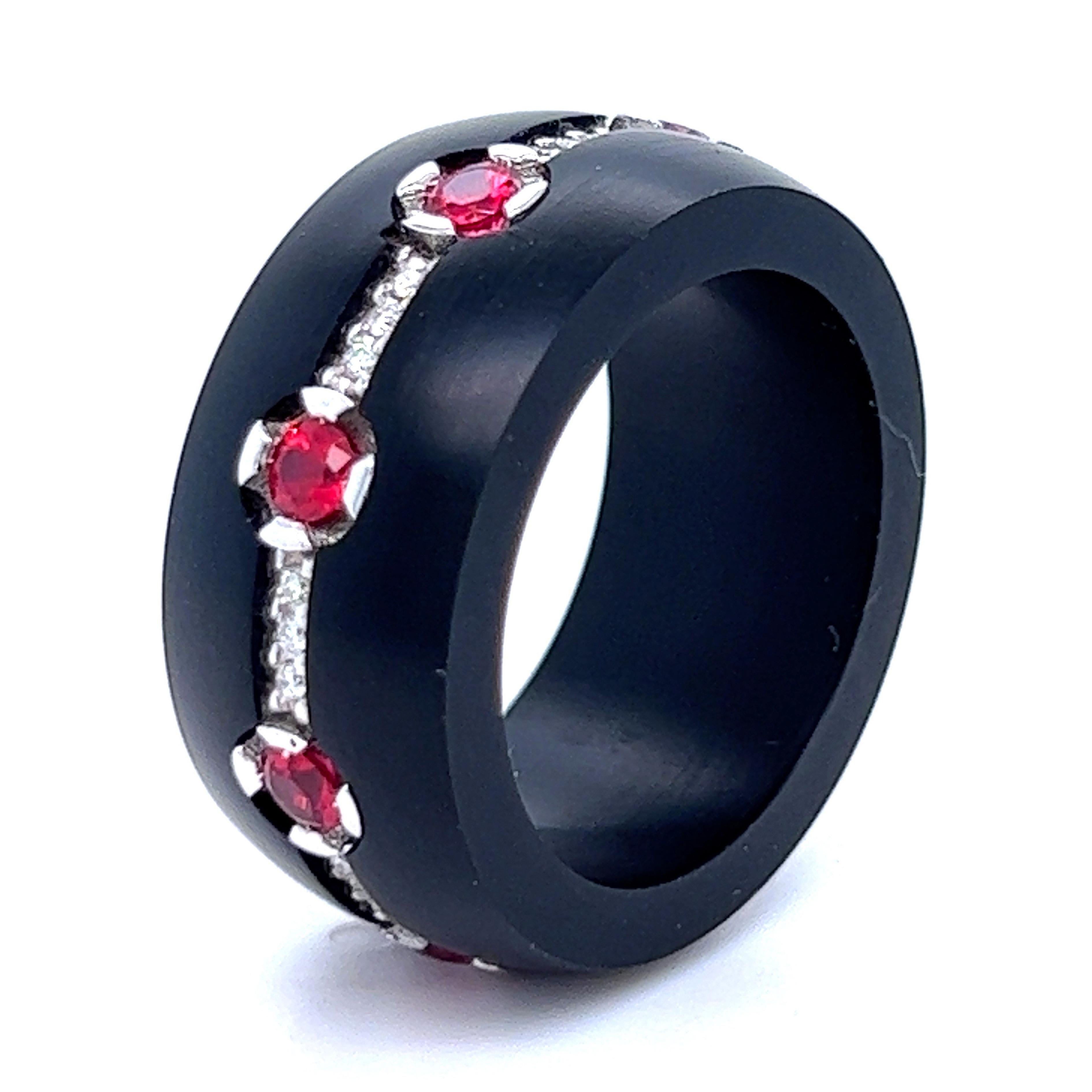 An original 1930, Art Déco, one-of-a-kind eternity band is set in a contemporary hand inlaid jet ring, to create a timeless, absolutely chic piece.
0.30Kt Top Quality Brilliant Cut White Diamond and 1Kt Natural Ruby combined with exquisite