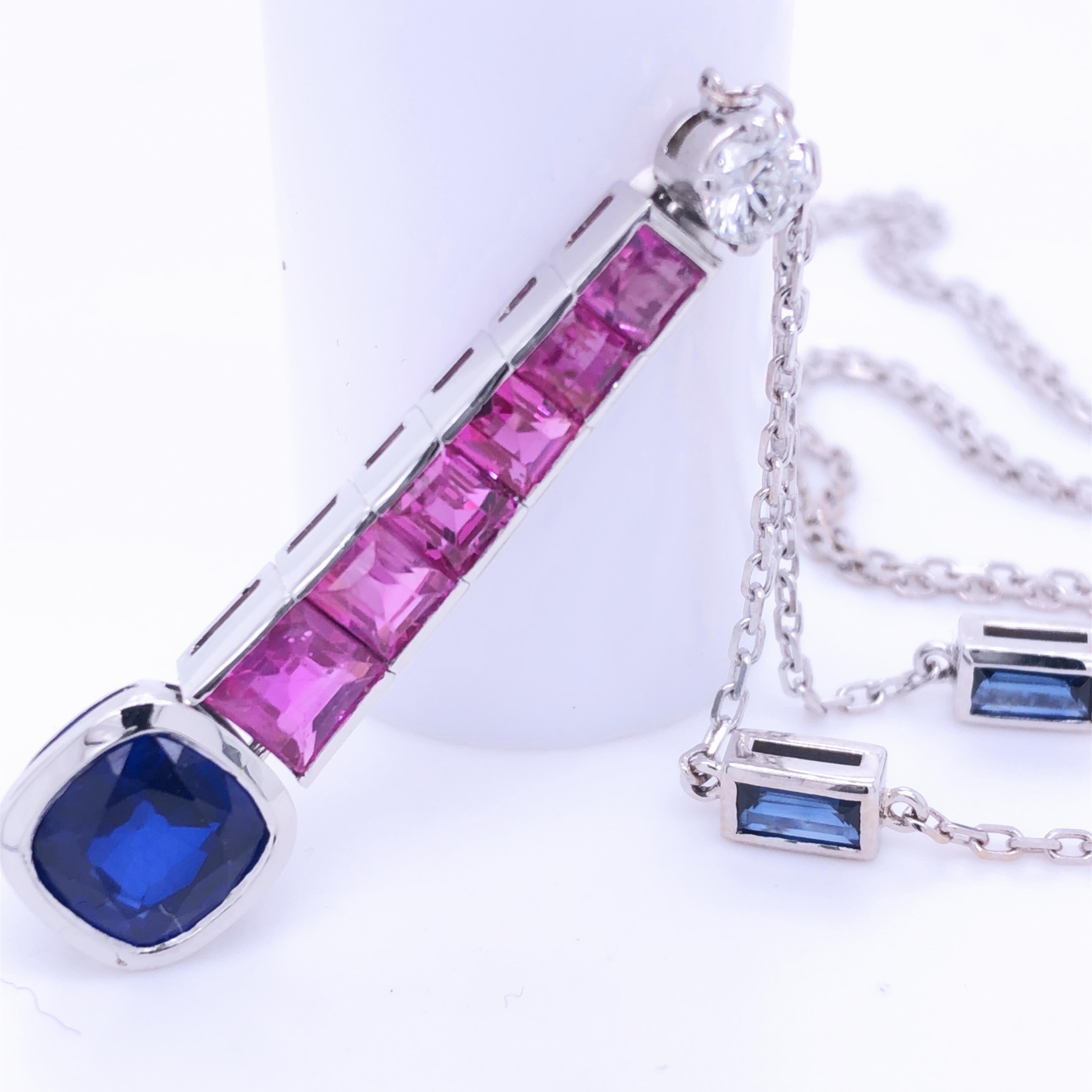 Awesome 1970 Platinum Necklace feturing a 2.51Kt Cushion Cut Royal Blue Sapphire, six 1.64Kt Princess Cut Burma Ruby, one 0.18Kt White Diamond Brilliant Cut and two, 0.49Kt Blue Sapphire Baguette Cut. A made in Italy timeless, geometric chain