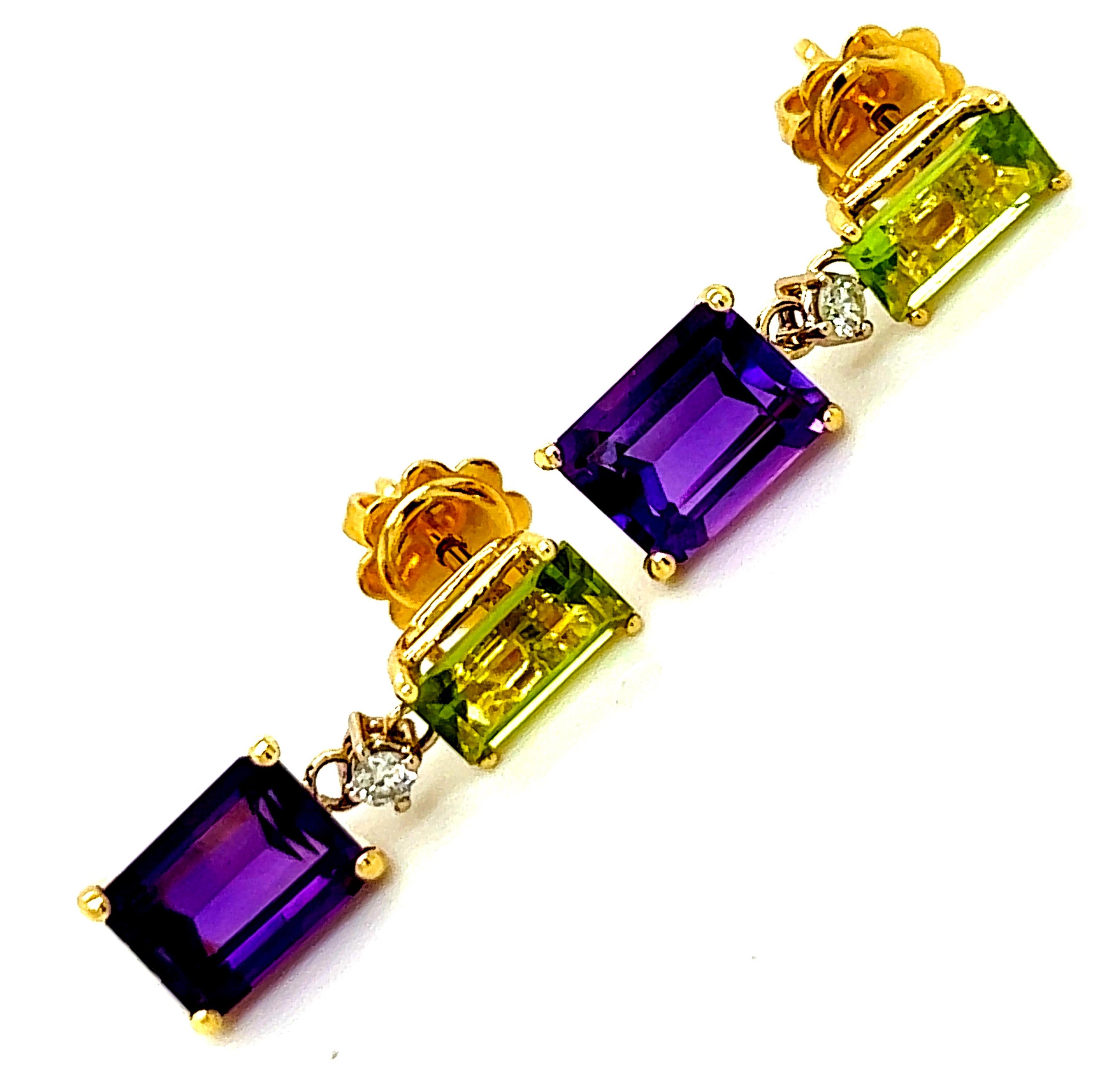 Chic yet timeless  3.40Kt Natural Peridot and 1.70Kt Amethyst Emerald Cut in a 0.10Kt  White Diamond 18KT Carat Yellow Gold Setting.
These top quality stones were carefully hand inlaid in Germany.
In our smart fitted suede leather case and
