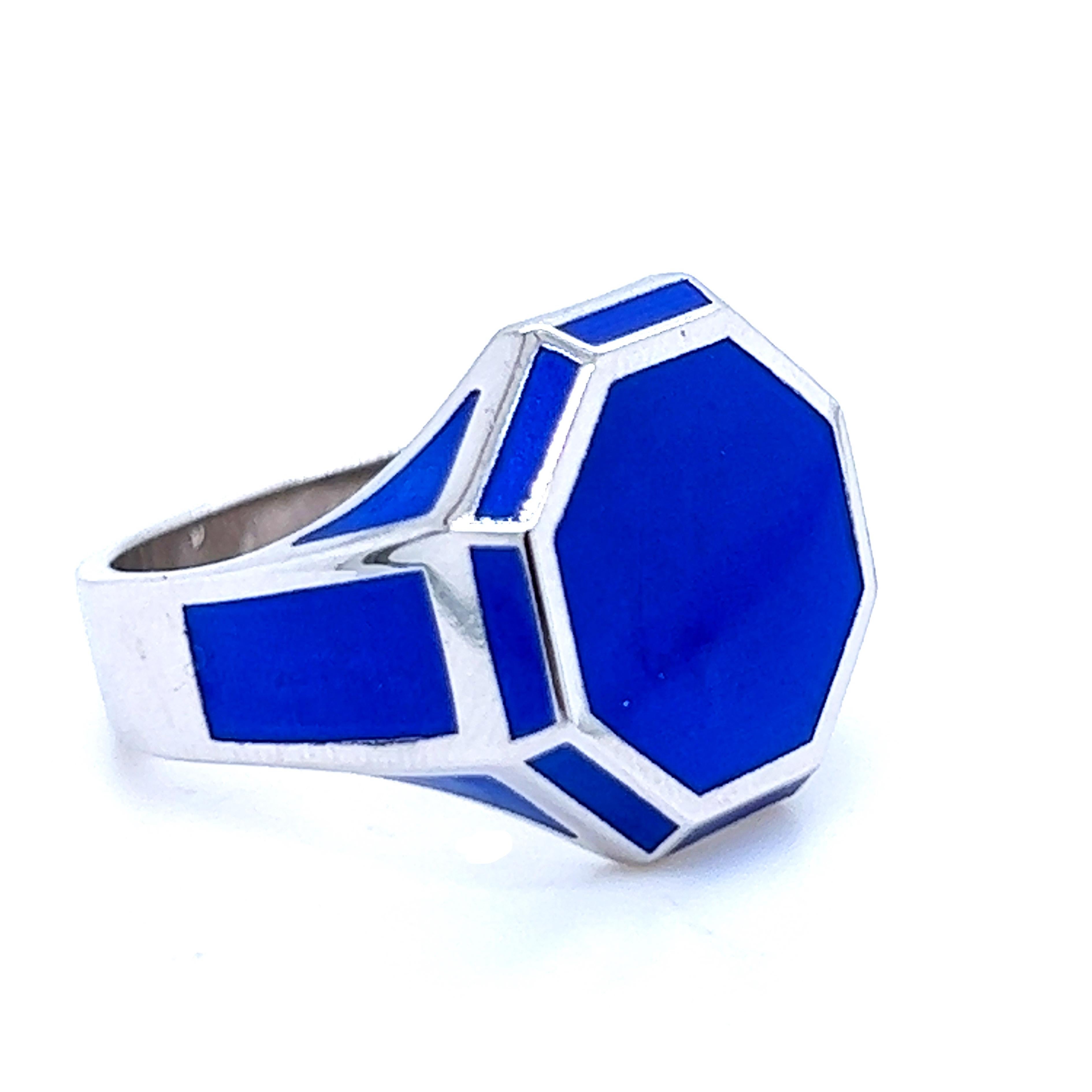 Contemporary, Chic yet Unique hexagonal royal blue hand enameled cocktail ring in a solid sterling silver setting. Perfect to wear as signet ring on the pinkie.
In our smart suede brown box and pouch.
Us Size 7 1/2,  French Size 56


