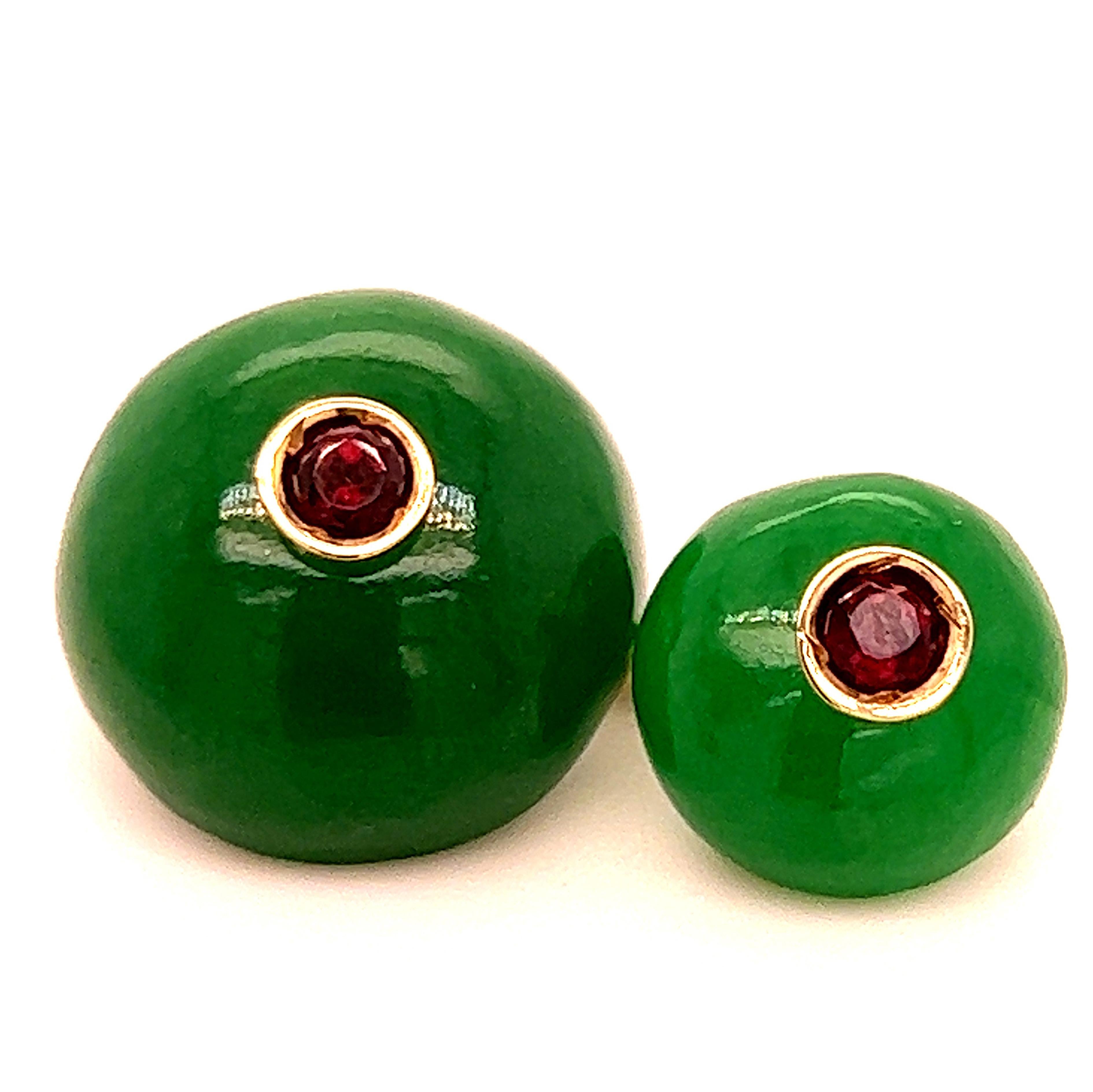 Absolutely Chic, Classy yet Timeless 33.54Kt Round Cabochon Shaped Hand Inlaid Natural Green Jade Cufflinks featuring four natural 0.38 Carat Brilliant Cut Ruby in a Yellow Gold setting.
All our Cufflinks are new, never been previously owned or