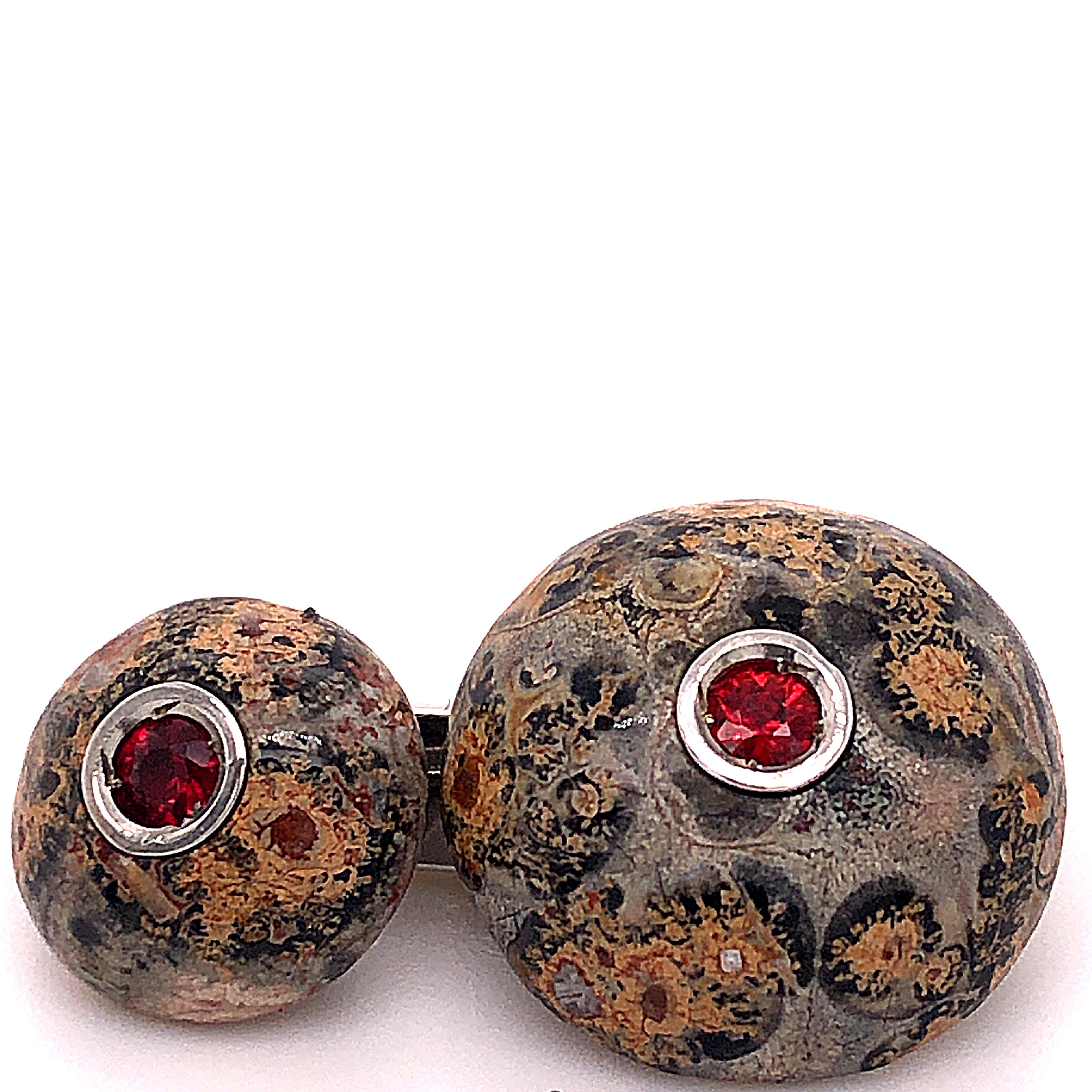 Absolutely Chic, Classy yet Timeless Cufflinks featuring 0.33 Kt, 4 natural red ruby brilliant cut in a Round Shaped, Hand Inlaid Natural Ocean Jasper Cabochon White Gold Setting.
In our Tobacco Leather Case and Pouch.