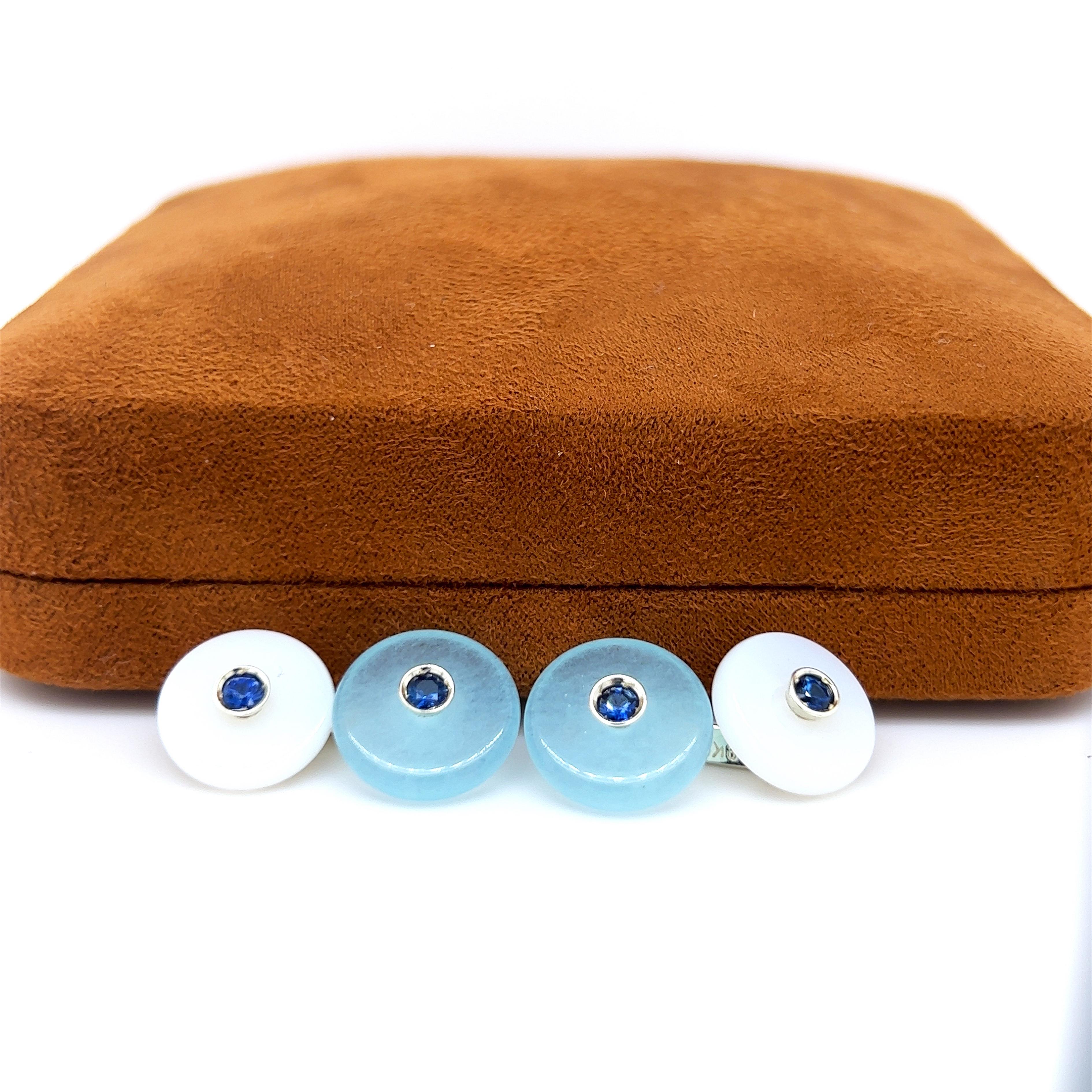 Chic, Unique Yet Timeless Cufflinks featuring 0.28 Carat Natural Brilliant Cut Sapphire in a 19.50 Natural Hand Inlaid Aquamarine and White Chalcedony White Gold Setting.
In our fitted Tobacco Suede Leather Case.