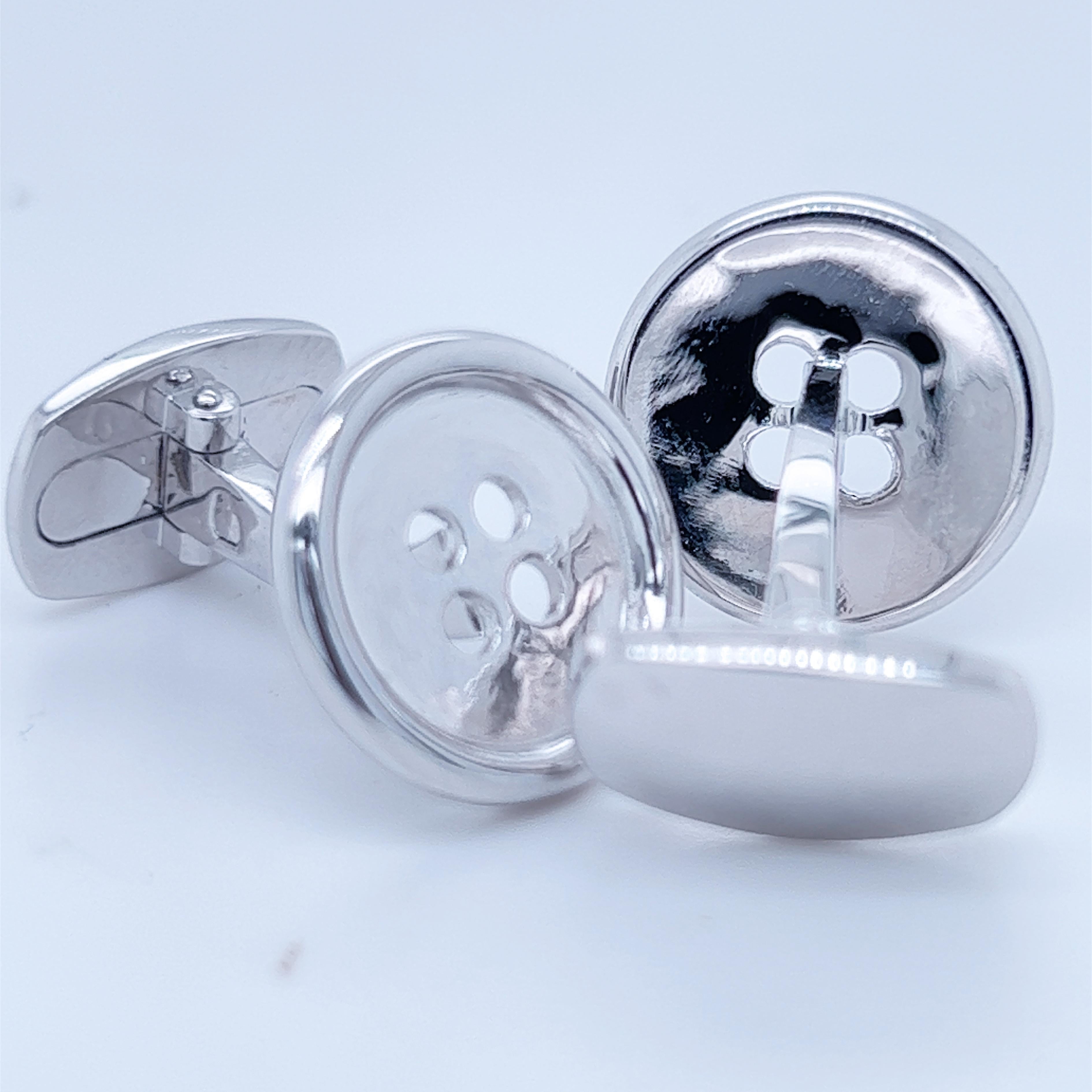 Smart, chic yet Timeless Solid Sterling Silver, Mirror Finish Button Shaped Cufflinks.
Delivered to your door beautifully gift wrapped in our fitted smart Whiskey Suede Leather Case  and pouch.