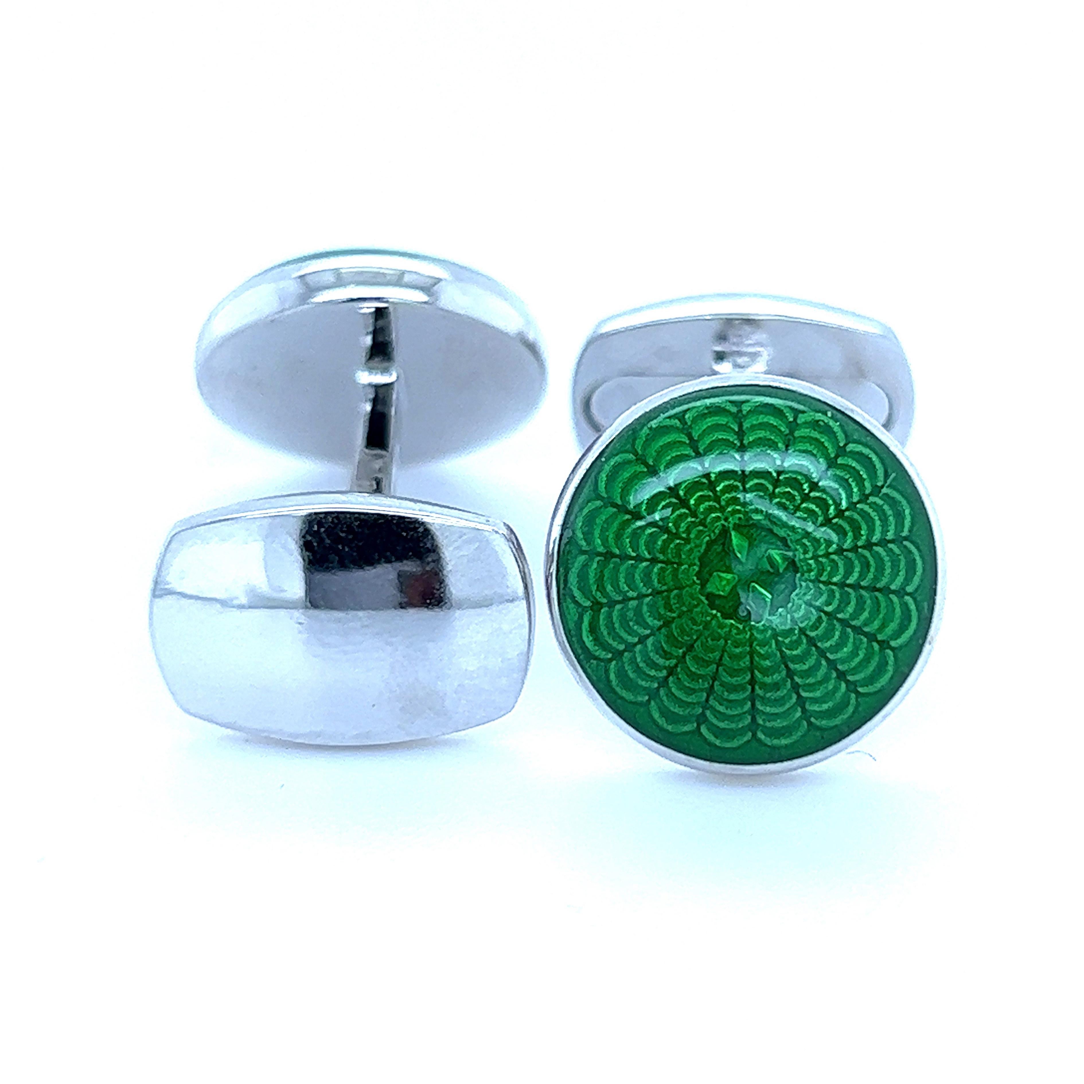 Chic yet Timeless, Unique yet Classic, Vivid Green Hand Enameled with the antique Champlevé Technique Round Sterling Silver Cufflinks.

In our Smart Tobacco Suede Leather Case and Pouch