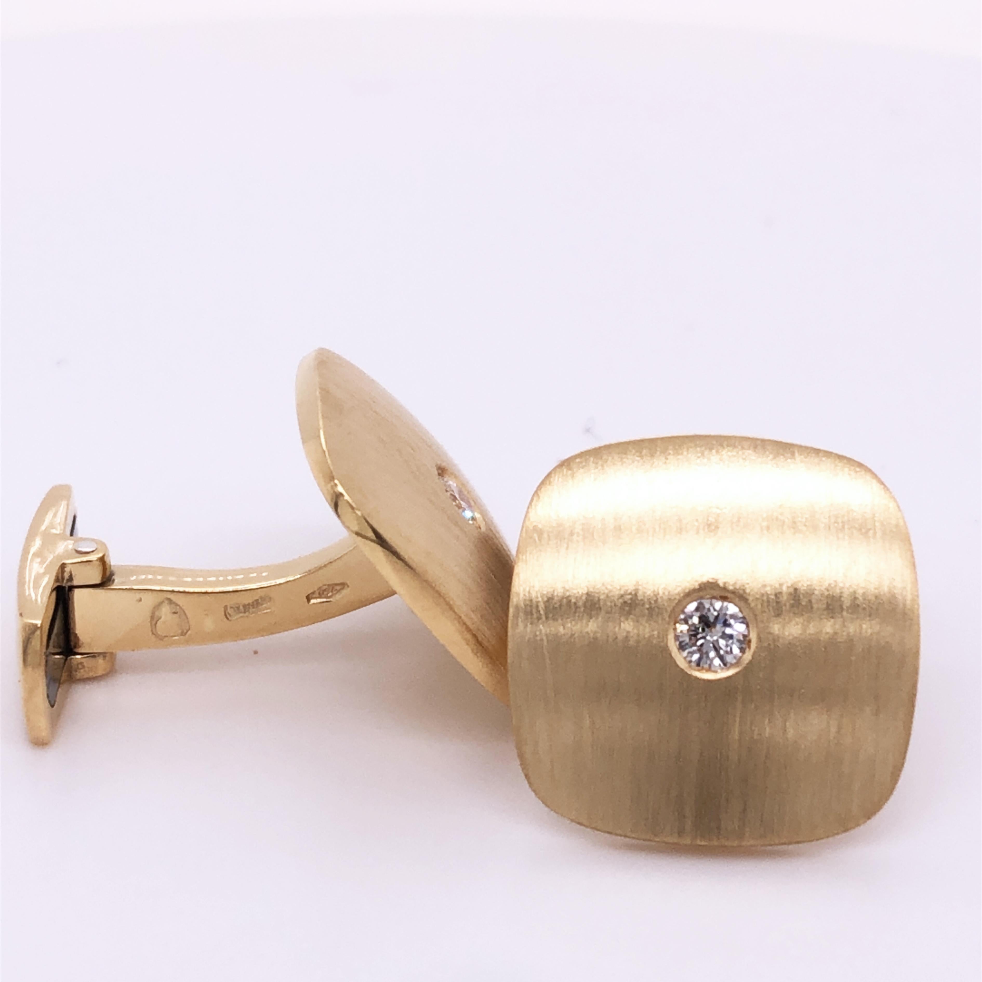 Unique, absolutely Chic yet Timeless 0.19 Carat White Diamond in an 18K Hand Brushed Yellow Gold Squared Shaped Setting Cufflinks, T-Bar back.
In our fitted Tobacco Leather Case and Pouch.