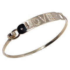Bracciale dell'amore contemporaneo in oro giallo con diamanti bianchi Berca