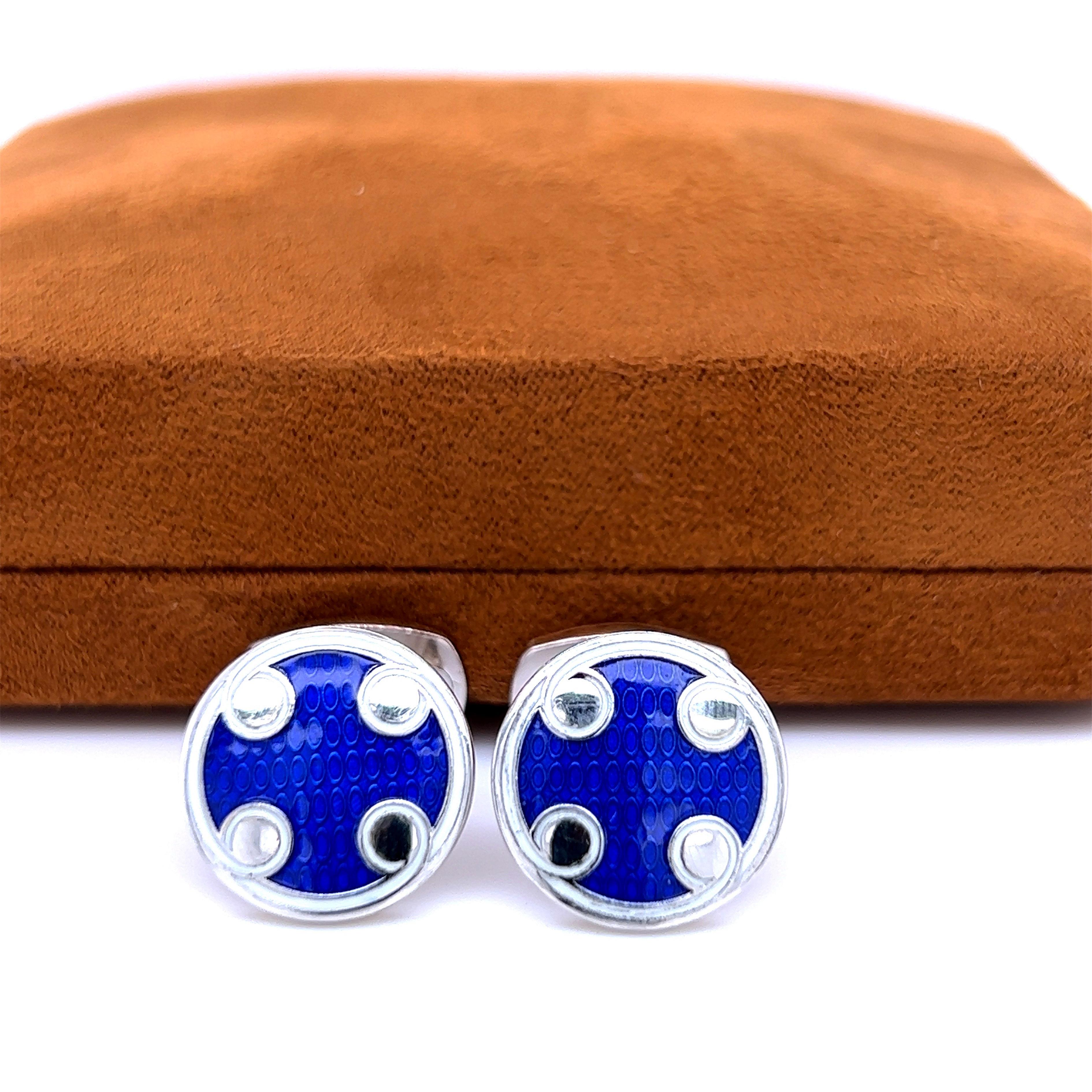 Unique, absolutely Chic yet Timeless White, Navy Blue Hand Enamelled Round Disk Shaped Sterling Silver Setting Cufflinks.
In our fitted Tobacco Suede Leather Case and Pouch.