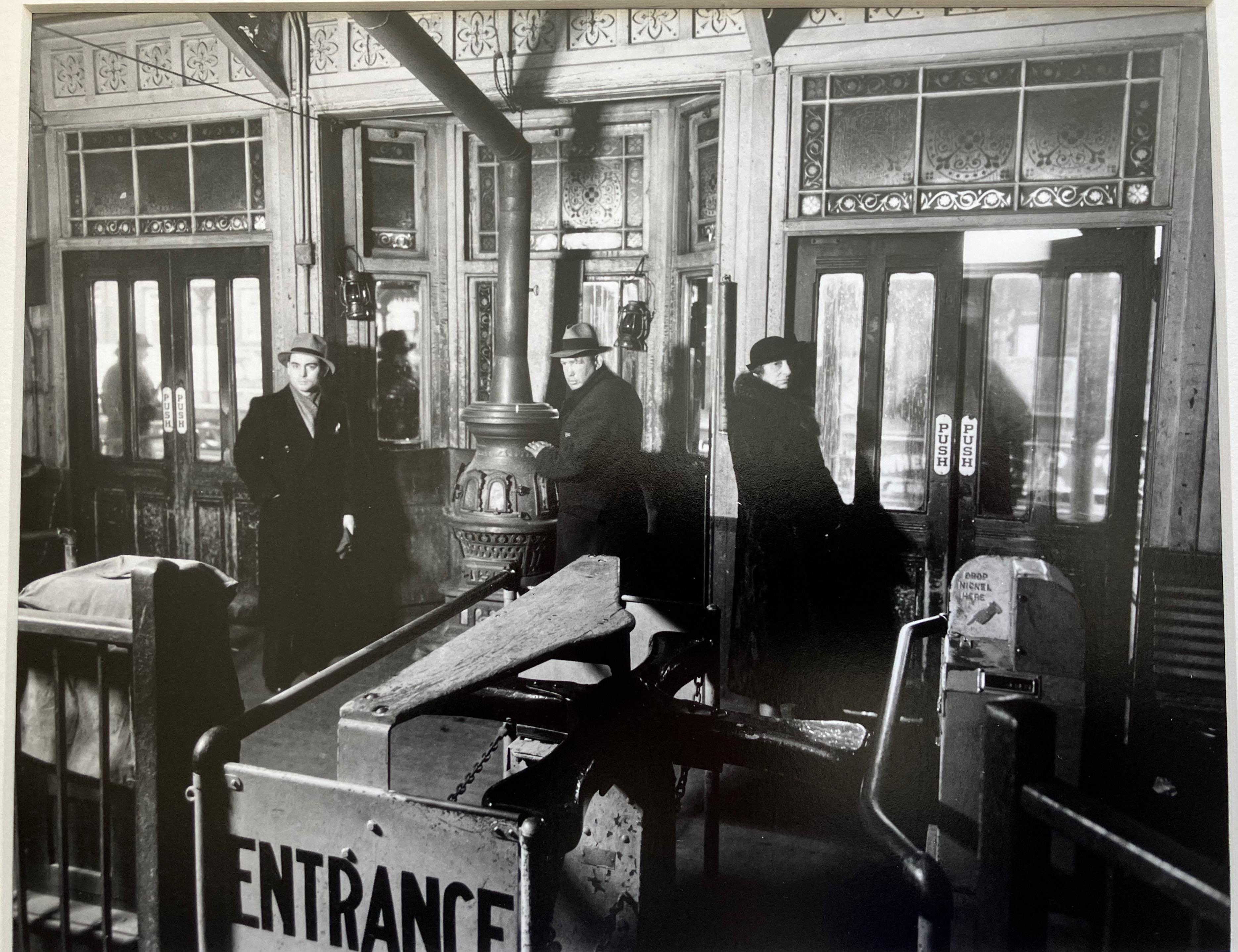 El Station Interior, Sixth and Ninth Avenue Lines, 72nd Street - Realist Photograph by Berenice Abbott