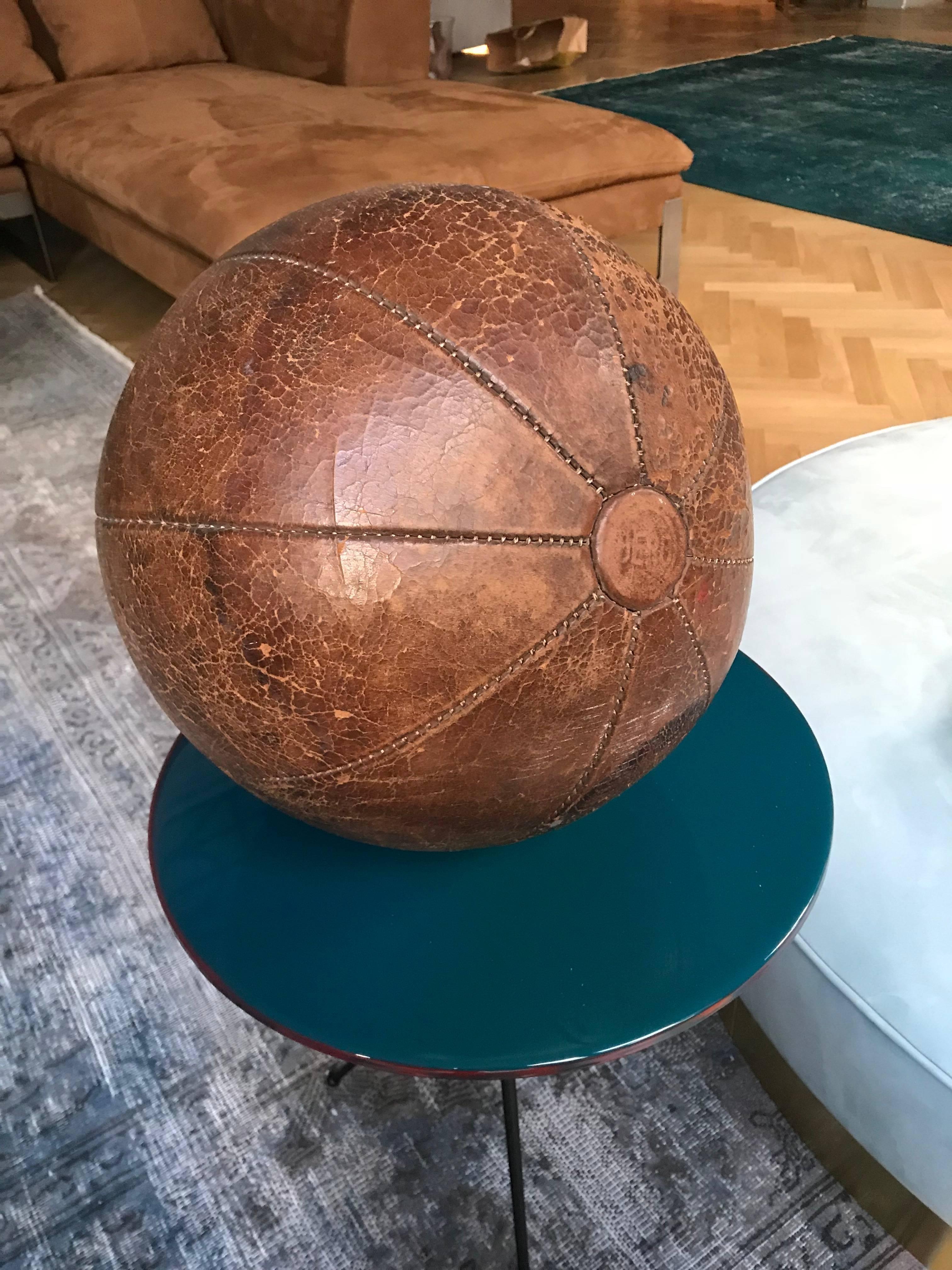 The medicine ball is part of a big collection from the 1920s-1930s, the time of the first gym enthusiasts in Germany.
The ball is handmade and filled with horse hair.
All balls are in a very good condition with nice patina and an intense color.