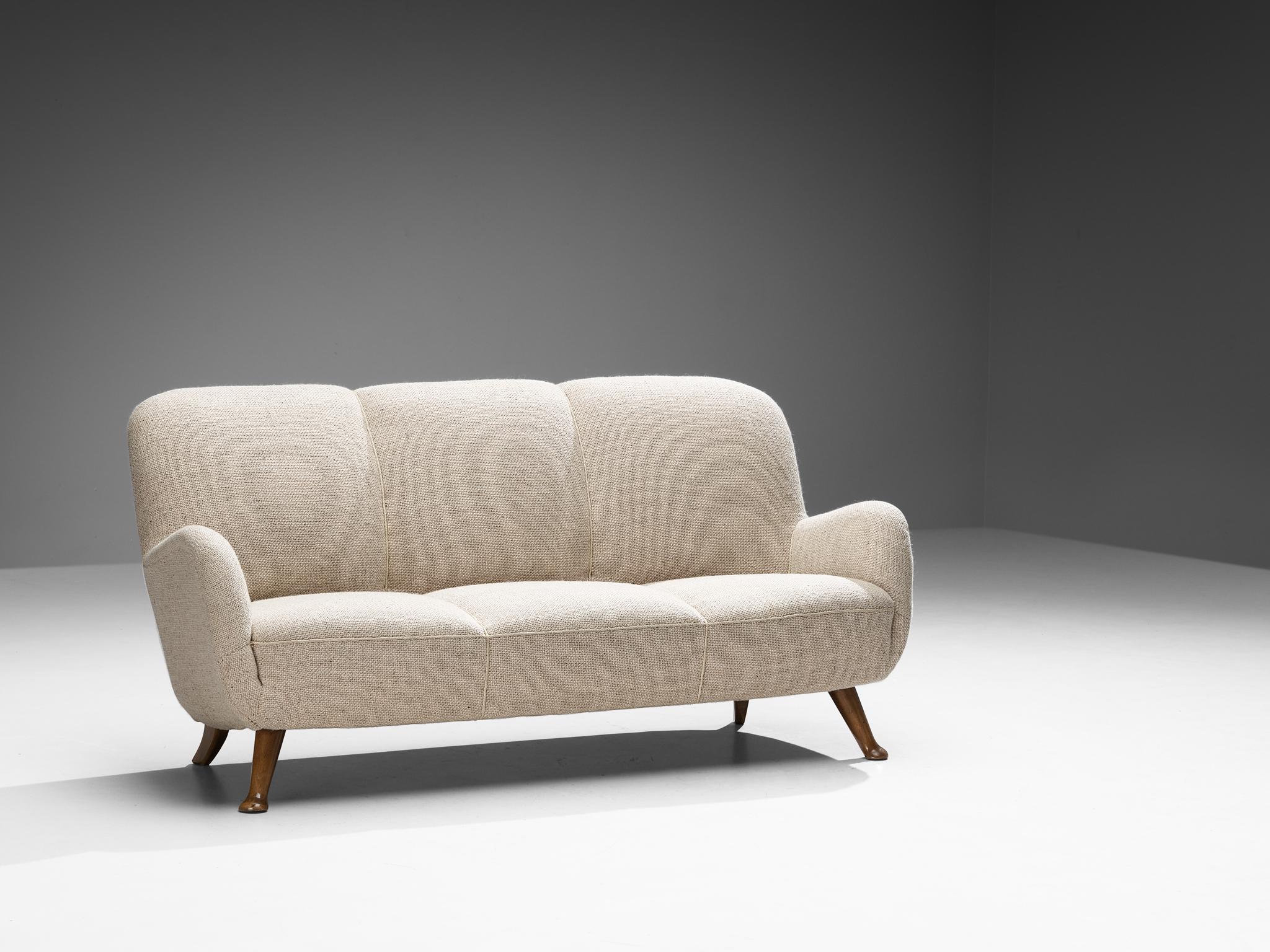 Berga Mobler, sofa, beech, velvet, Denmark, 1940s.

This bold and curvy sofa is based on a solid construction with a tender touch due to the soft texture of the teddy fabric. The whole shell is slightly tilted backwards. The corpus rests on four