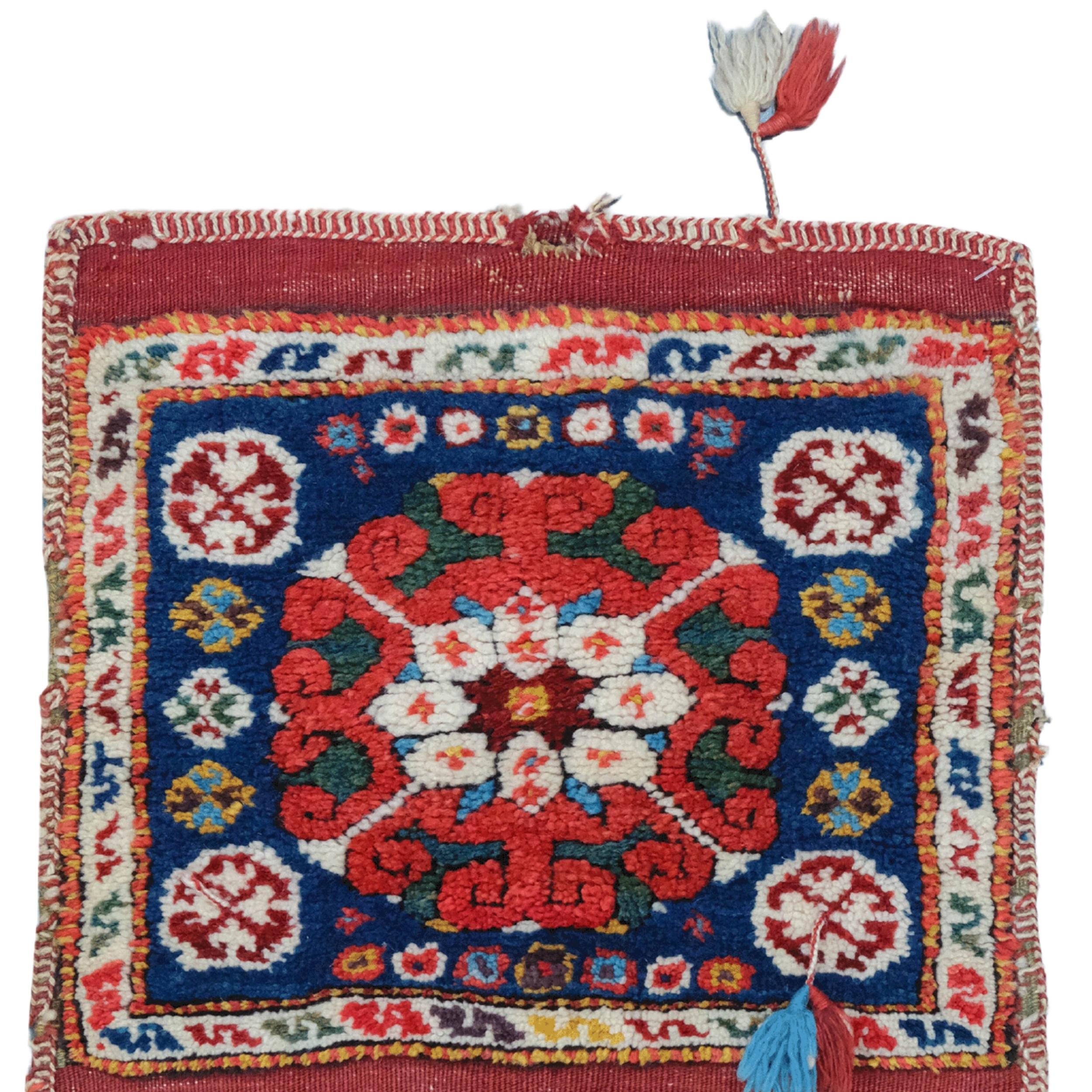 Middle of The 19th Century Bergama Heybe

This antique Bergama saddlebag carpet dates from the mid-19th century and is a rare piece reflecting the rich weaving tradition of Anatolia. The carpet consists of two square-shaped main sections and colored