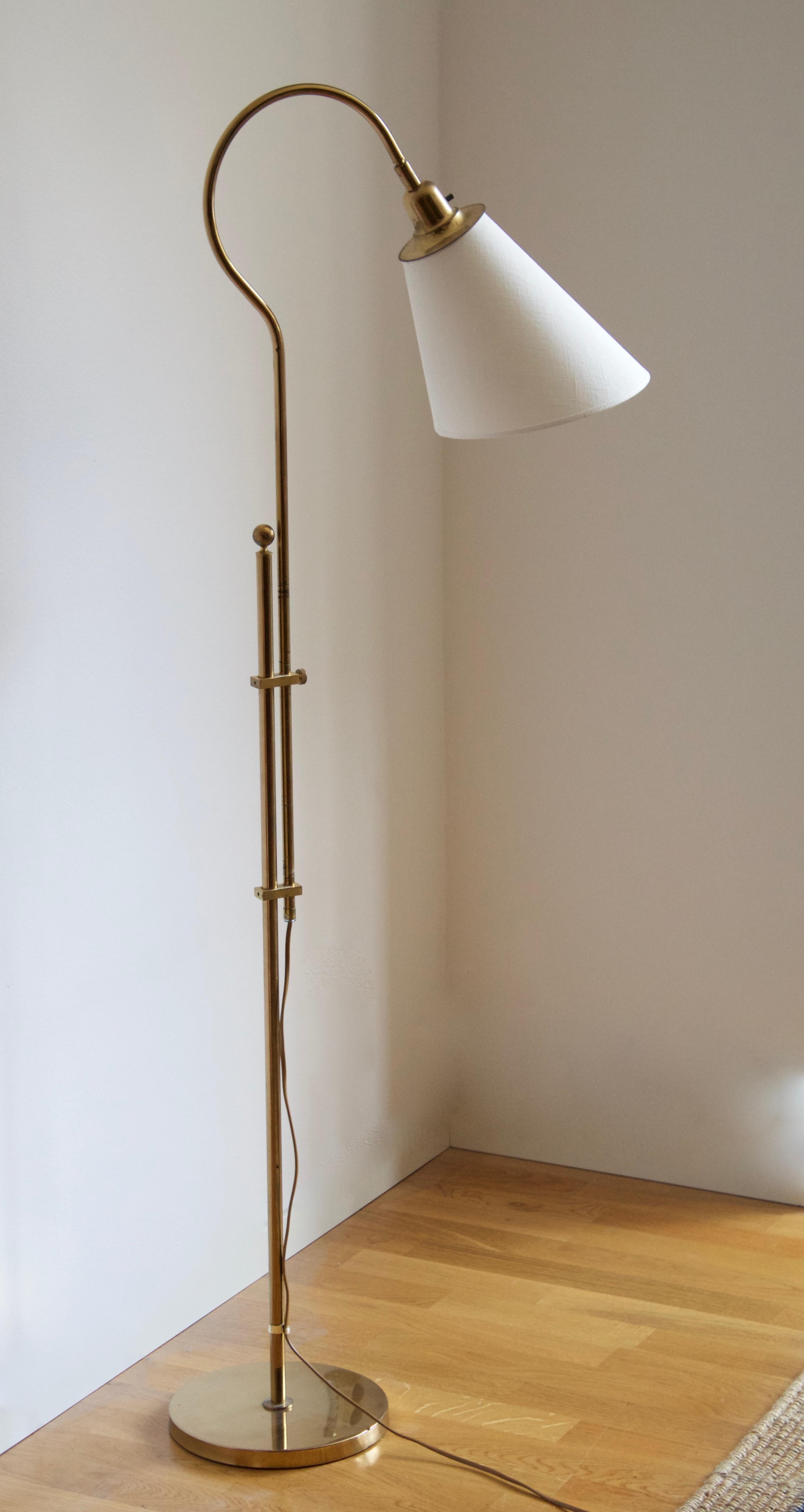An adjustable floor lamp. Designed and produced by Bergboms, Sweden, c. 1970s. Brand new fabric lampshade.

Other designers of the period include Paavo Tynell, Hans Bergström, Josef Frank, and Kaare Klint.