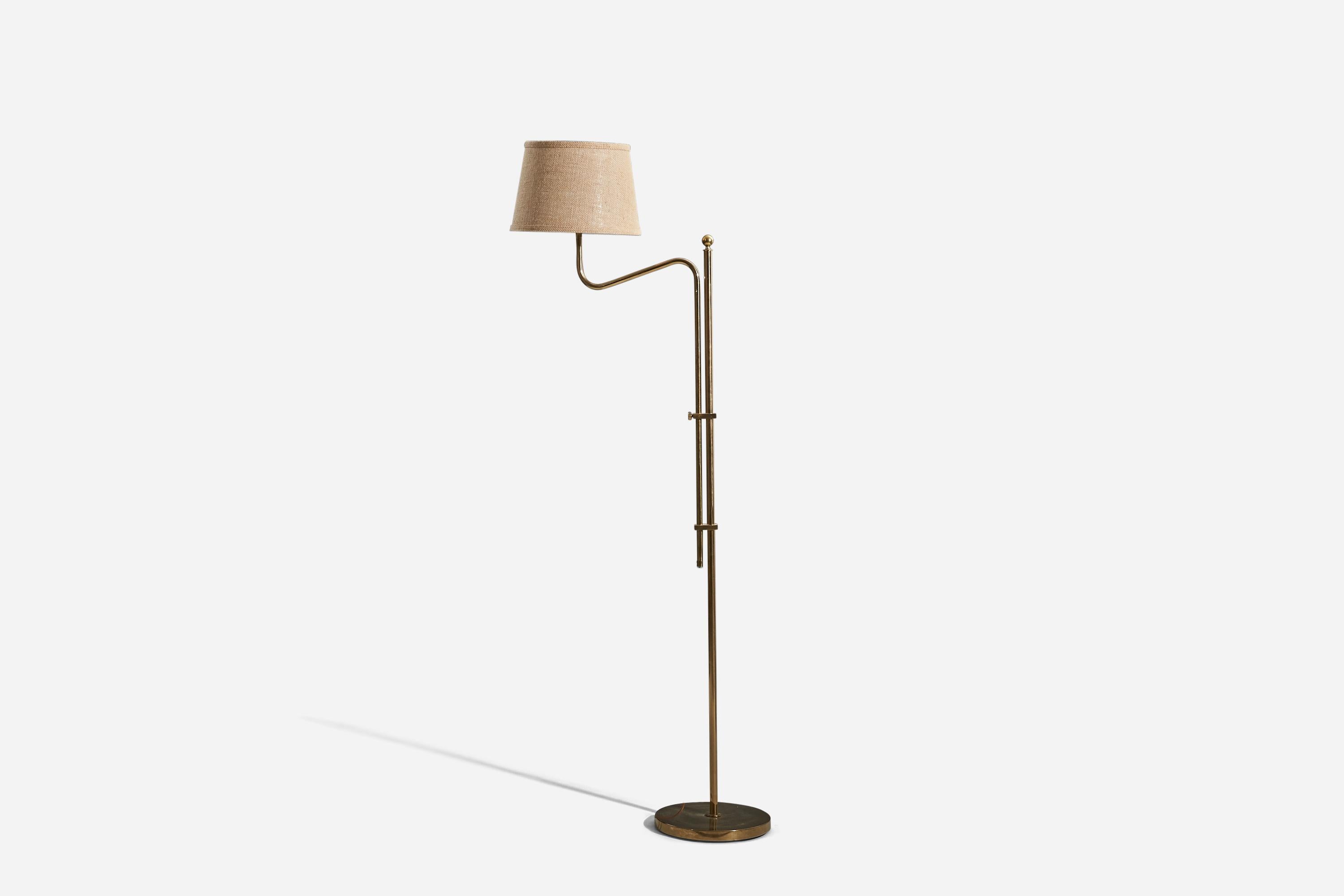 A brass and fabric floor lamp designed and produced by Bergboms, Sweden, c. 1970s. 

Sold with Lampshade. 
Stated dimensions refer to the Floor Lamp with Shade. 
Variable dimensions, measured as illustrated in the first image.
