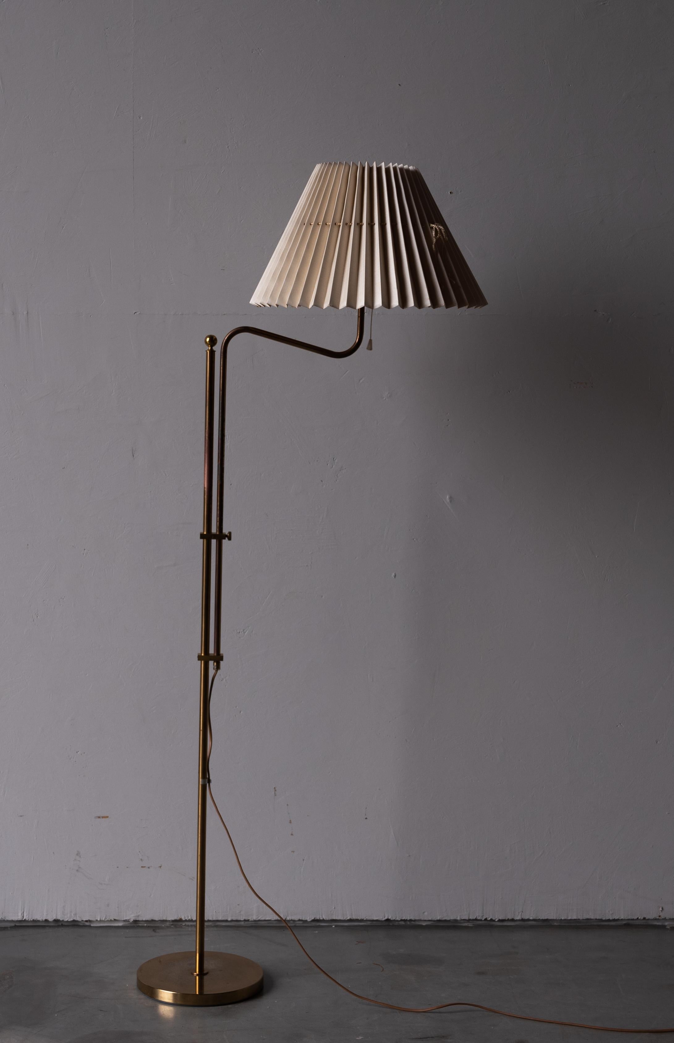 A floor lamp. Designed and produced by Bergboms, Sweden, c. 1970s. Original lampshade.

Other designers of the period include Paavo Tynell, Hans Bergström, Josef Frank, and Kaare Klint.