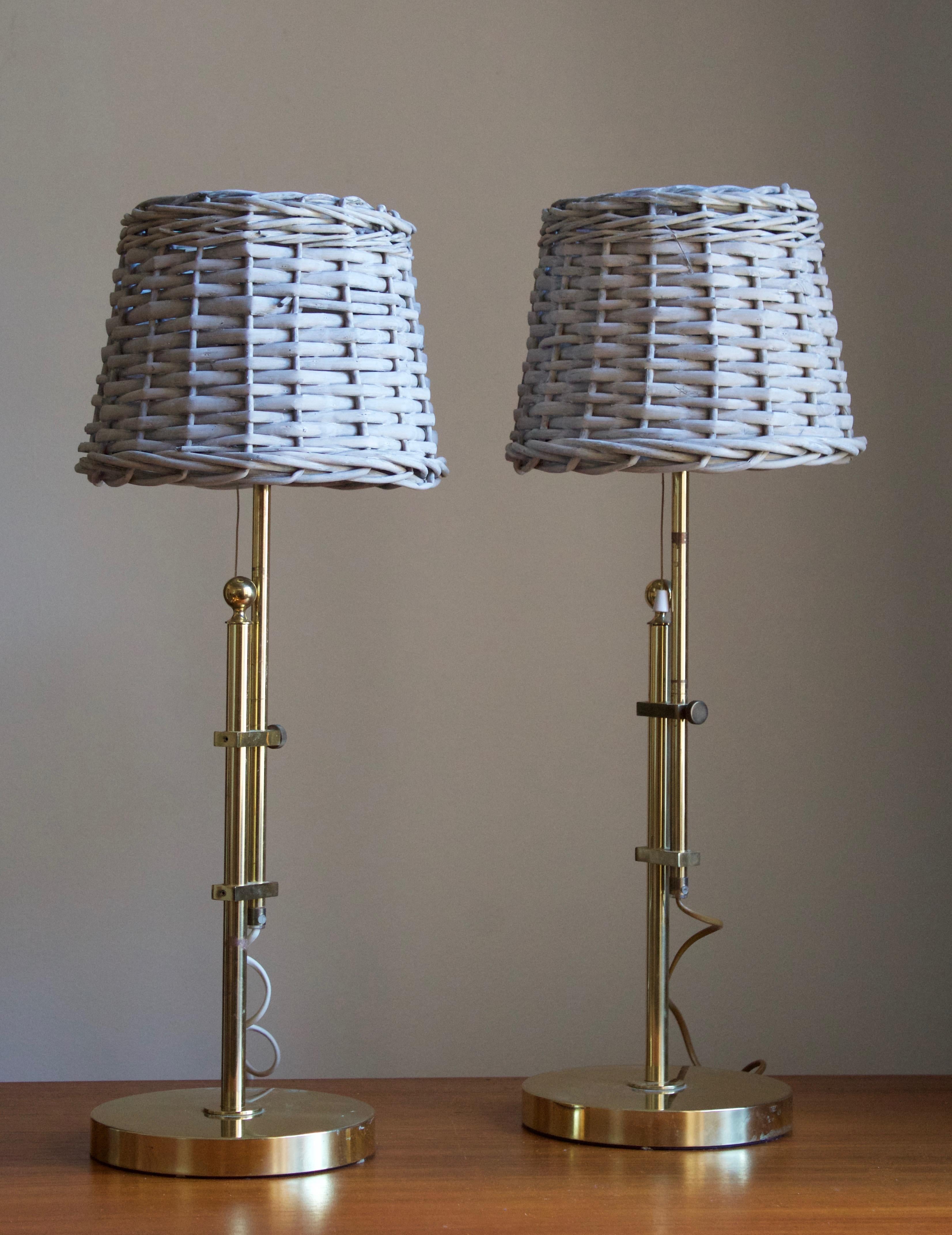 An adjustable table lamp. Designed and produced by Bergboms, Sweden, Designed c. 1960s. This example c. 1970s-1980s production. 

Stated dimensions exclude lampshades. Upon request illustrated lampshades can be included. Dimensions variable.