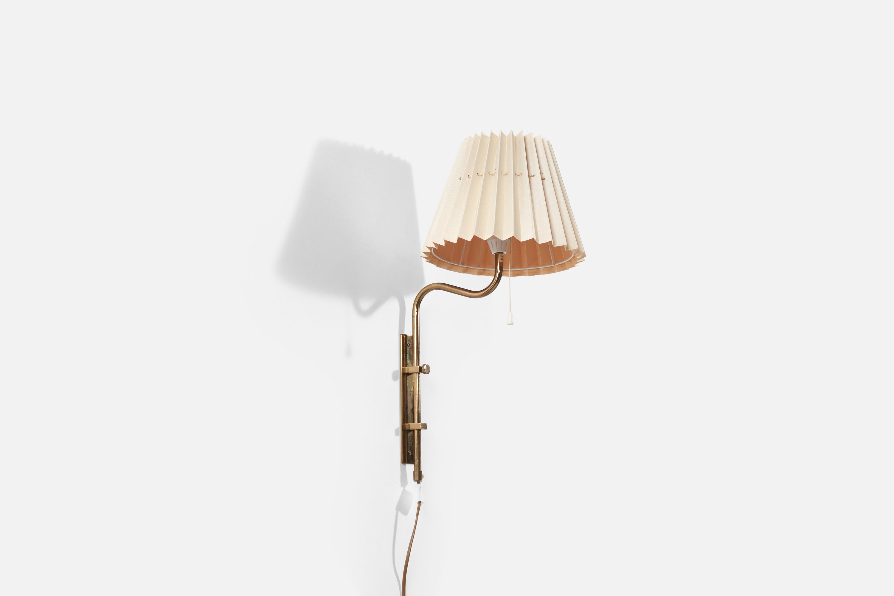 A brass and paper shade wall light / sconce by Bergboms, Sweden, 1970s.