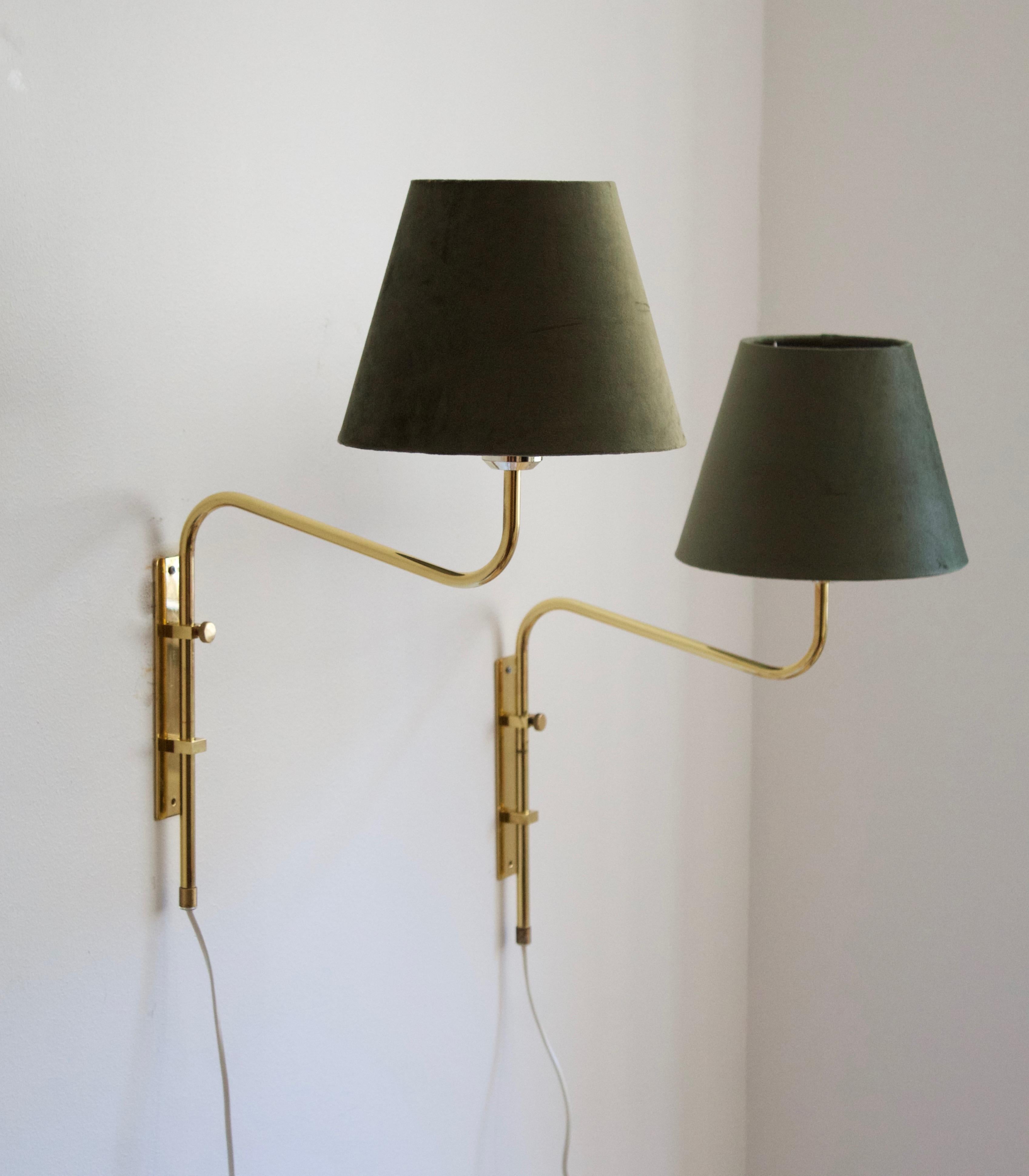 A pair of adjustable wall lights / wall sconces. Designed and produced by Bergboms, Sweden, c. 1970s. Labeled.

Measurements include brand new lampshades illustrated.

Other designers of the period include Paavo Tynell, Hans Bergström, Josef