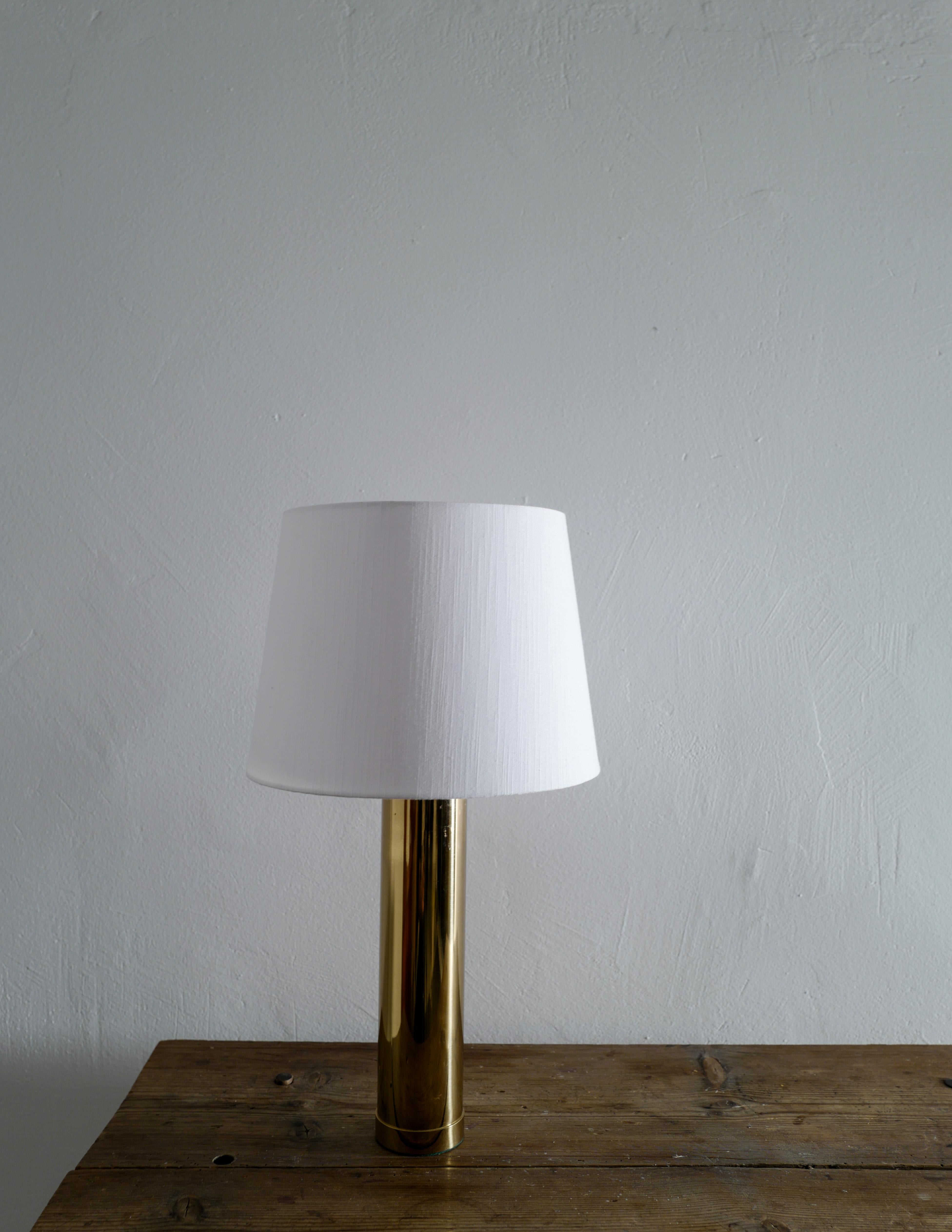Rare table lamp in brass produced by Bergboms during the 1960s.
Signed and in good condition with small signs of use.

Height is measured without the shade and shade is excluded from the purchase.