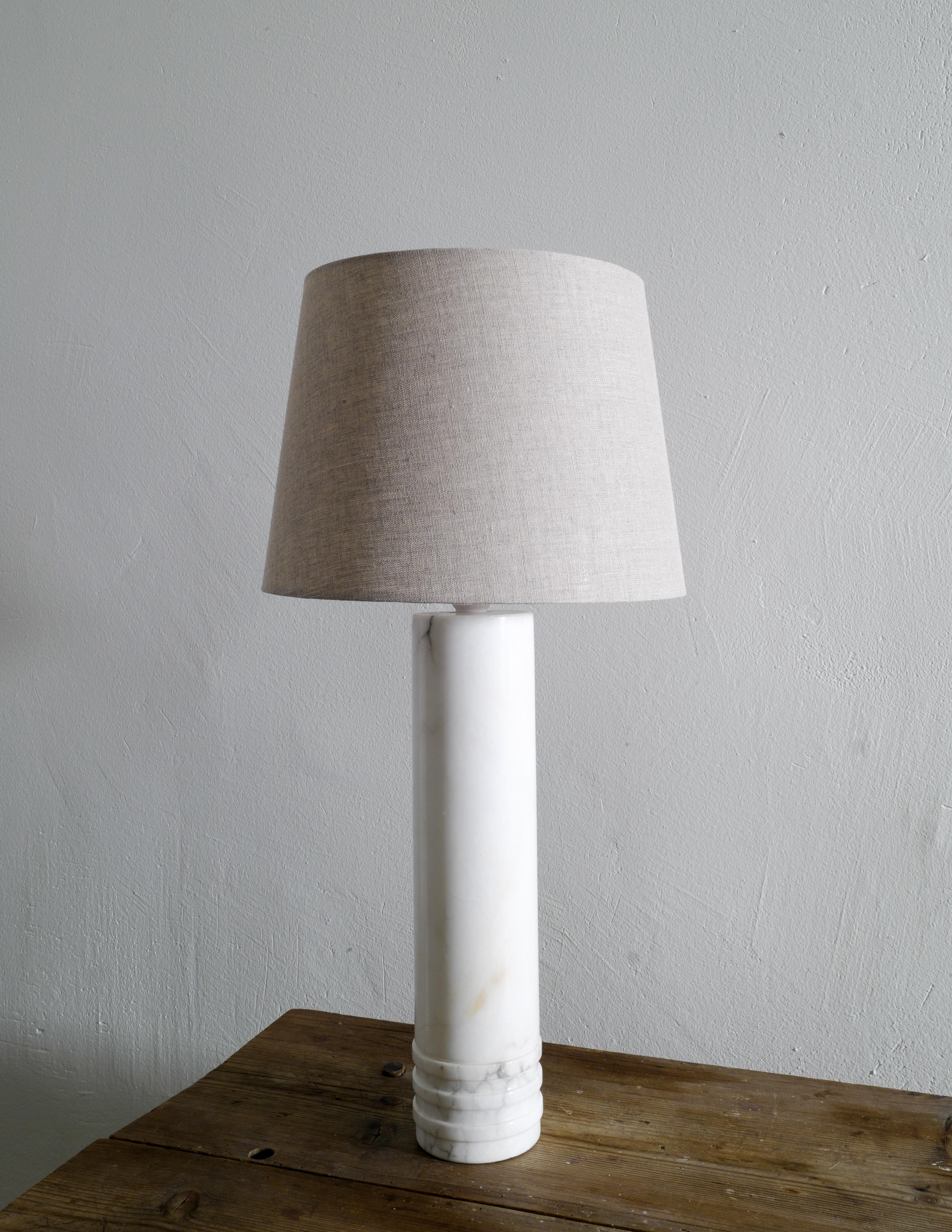 Rare table lamp produced by Bergboms in solid marble during the 1960s. In good original condition with the original sticker still on. Measurements without the shade. 

Shade is excluded from the purchase.