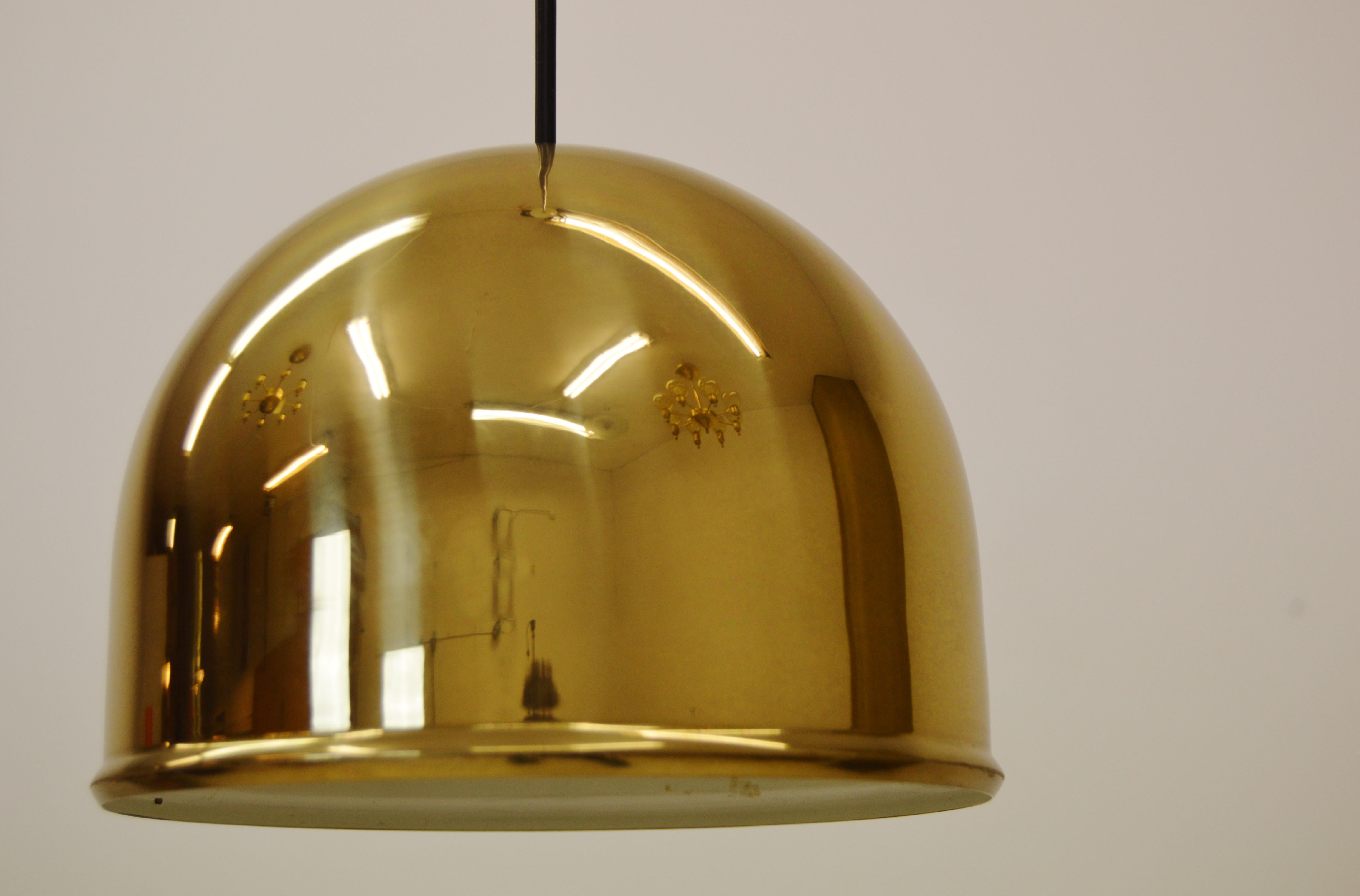 Produced by Bergbom in Sweden during the 1960s.
Brass outside and white laquered inside.