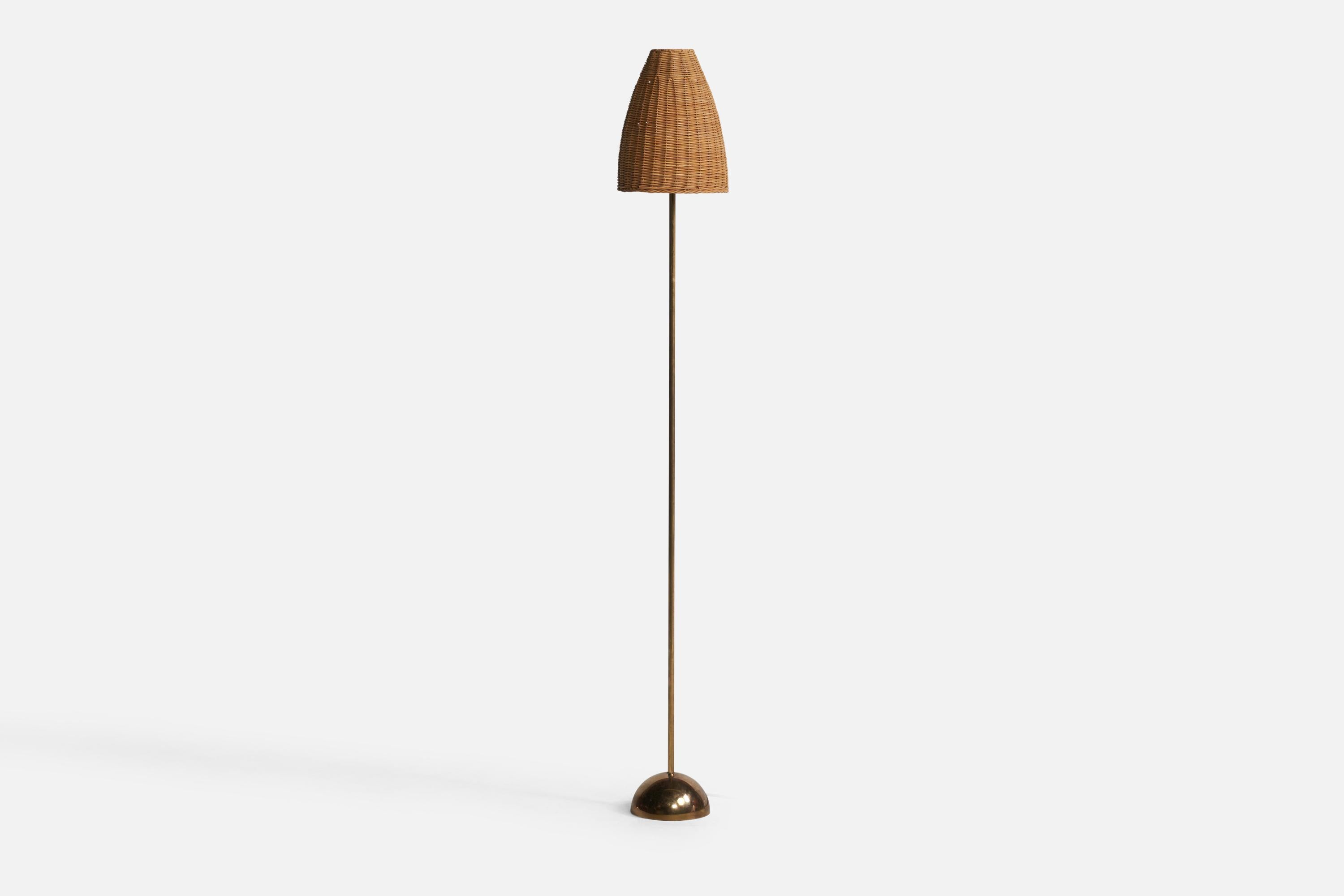 A brass and rattan floor lamp designed and produced by Bergboms, Sweden, c. 1960s.

Overall Dimensions (inches): 51” H x 7.15” Diameter. Stated dimensions include shade.
Bulb Specifications: E-26 Bulb
Number of Sockets: 1
All lighting will be