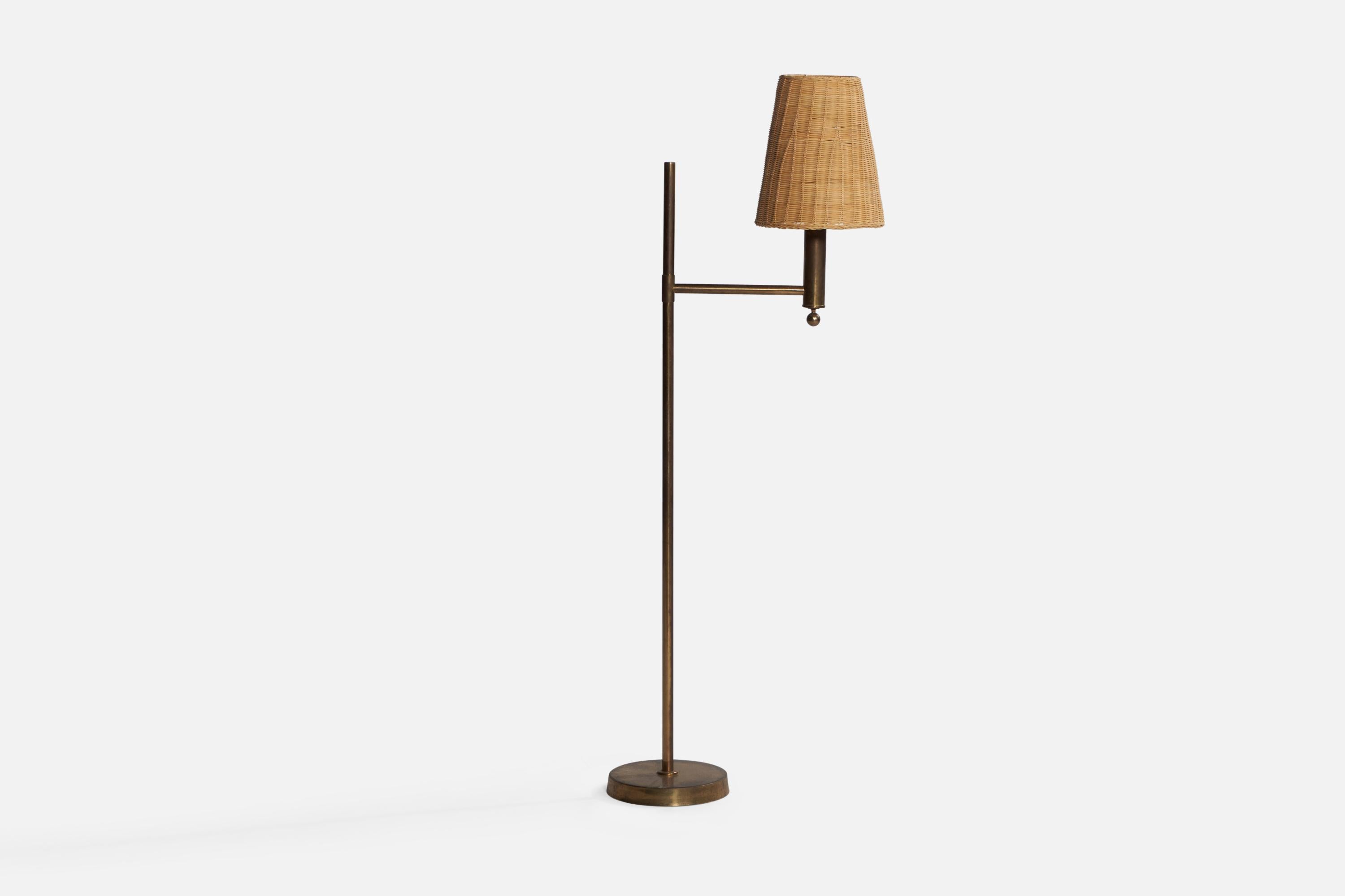 A brass and rattan floor lamp designed and produced by Bergboms, Sweden, c. 1960s.

Overall Dimensions (inches): 53.5” H x 9.45” W x 20.15” D. Stated dimensions include shade.
Bulb Specifications: E-26 Bulb
Number of Sockets: 1
All lighting will be