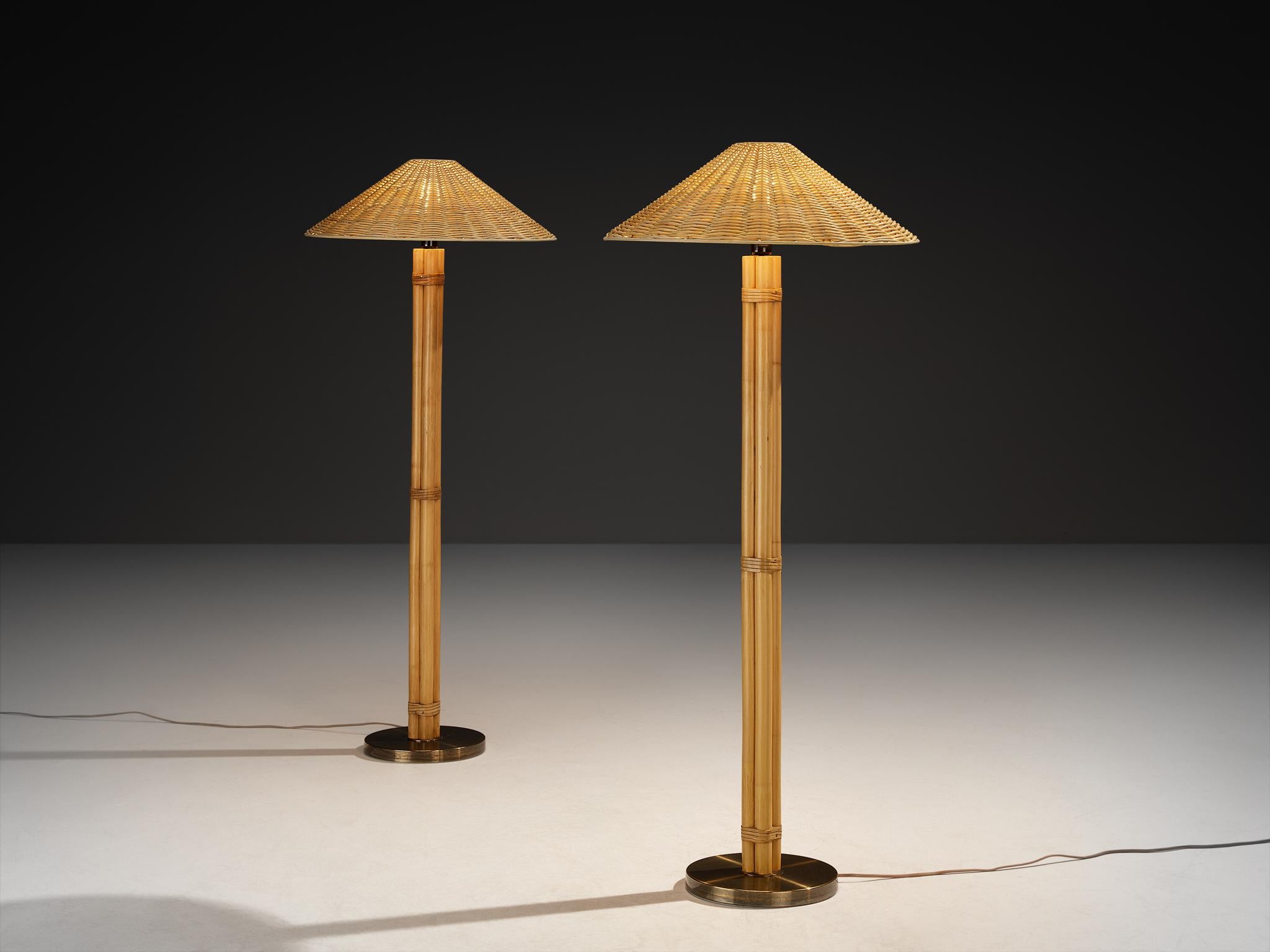 Lampade da terra Bergboms, modello G 105, Svezia, anni '60

Una raffinata coppia di lampade da terra disegnate da Bergboms negli anni '60. Ogni lampada è realizzata in bambù, con un paralume in canna intrecciata e dettagli in ottone che evidenziano