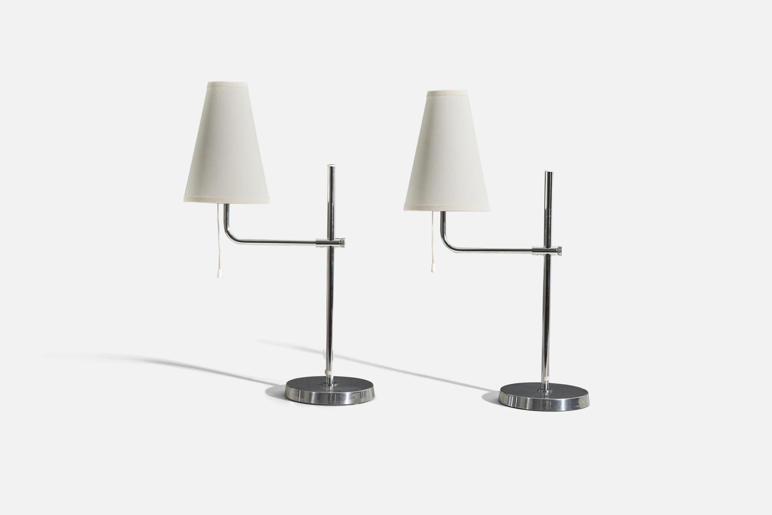 A pair of chrome and fabric table lamps designed and produced by Bergboms, Sweden, c. 1970s.

Variable dimensions, measured as illustrated in the first image. 

Sold without lampshade. 
Dimensions of Lamp (inches) : 19.5 x 7.62 x 14 (H x W x