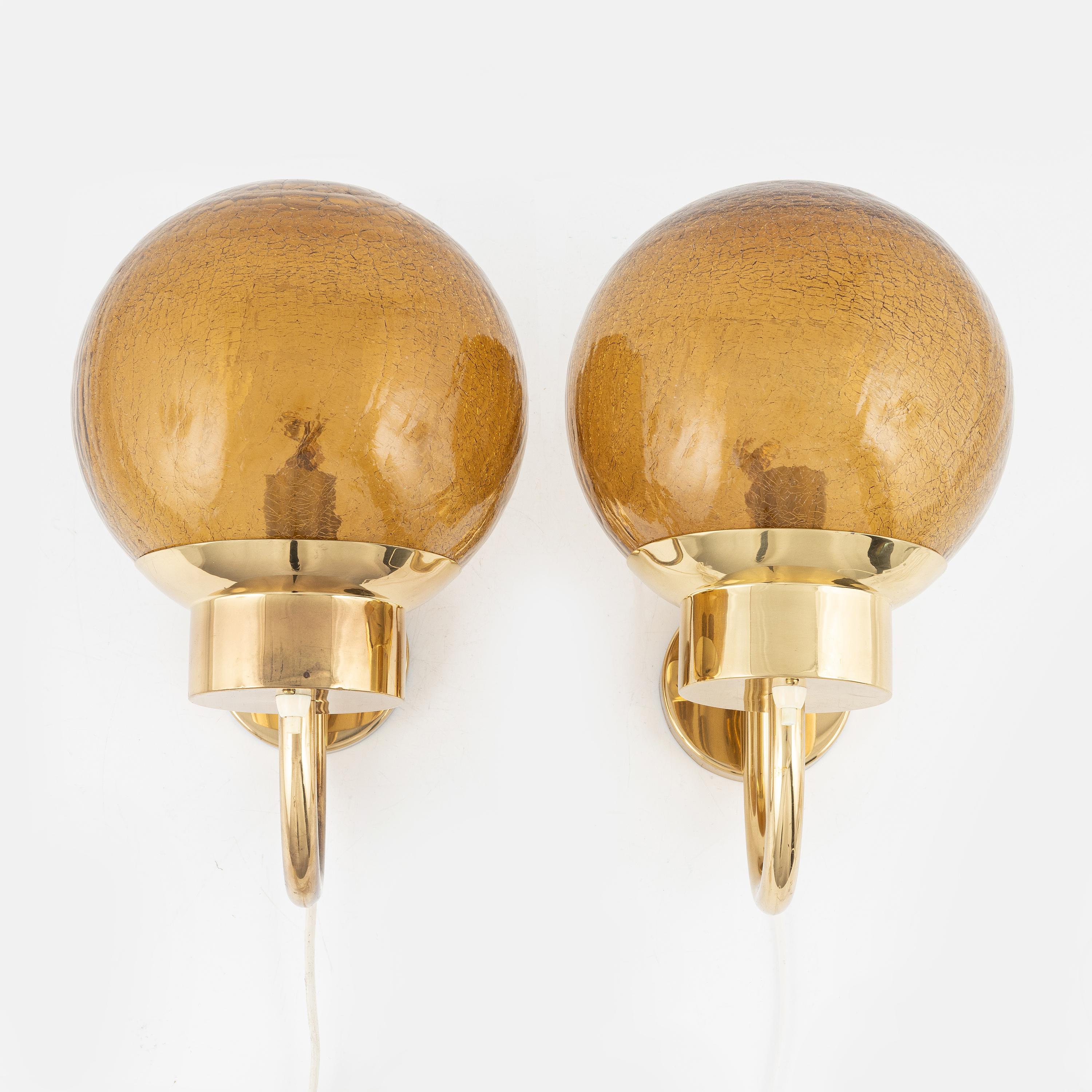 20th Century Bergboms sconces a pair in brass and amber glass Sweden 1960
