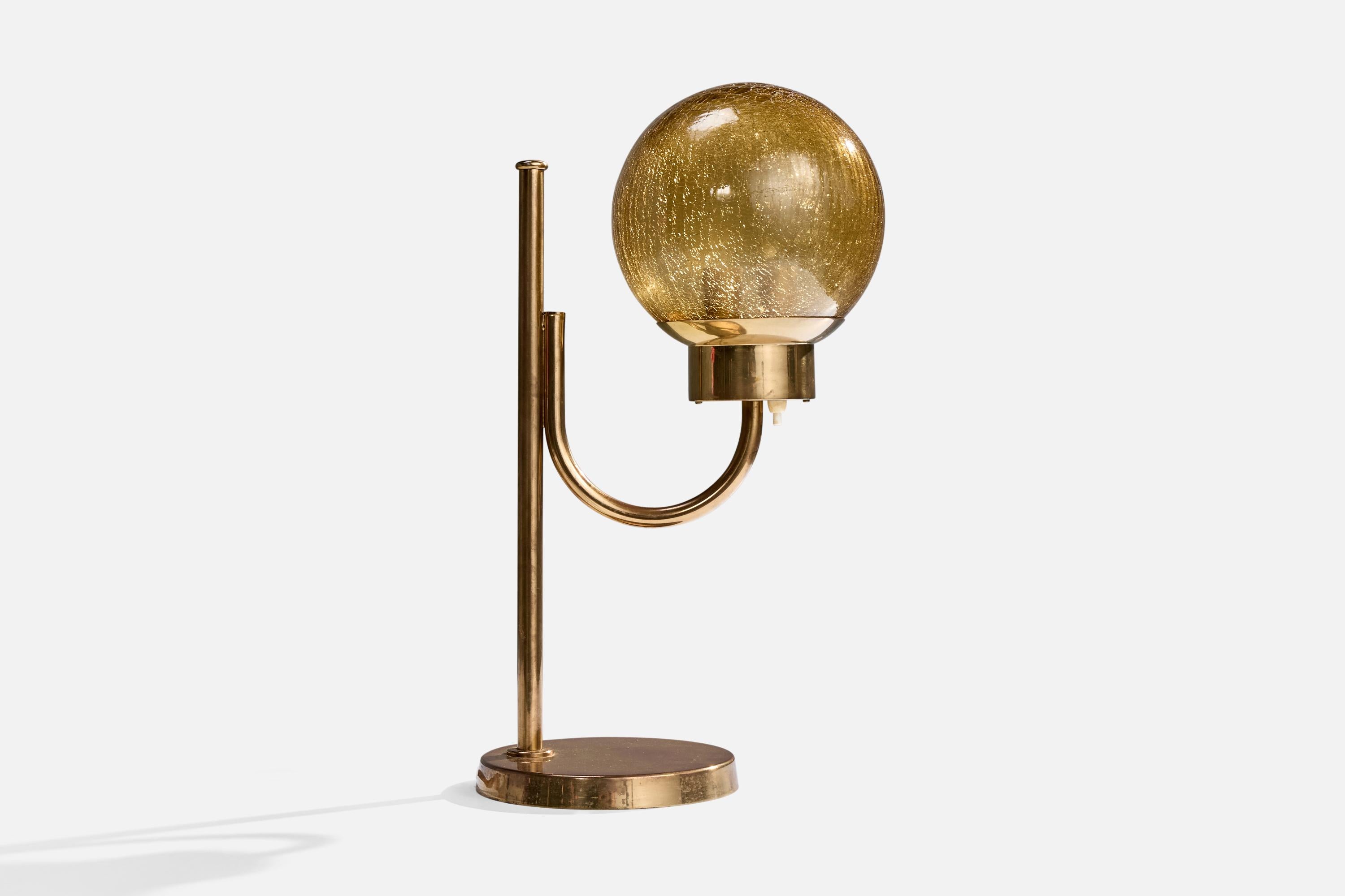 A brass and amber-colored blown glass table lamp designed and produced by Bergboms, Sweden, c. 1970s.

Dimensions of Lamp (inches): 20.5