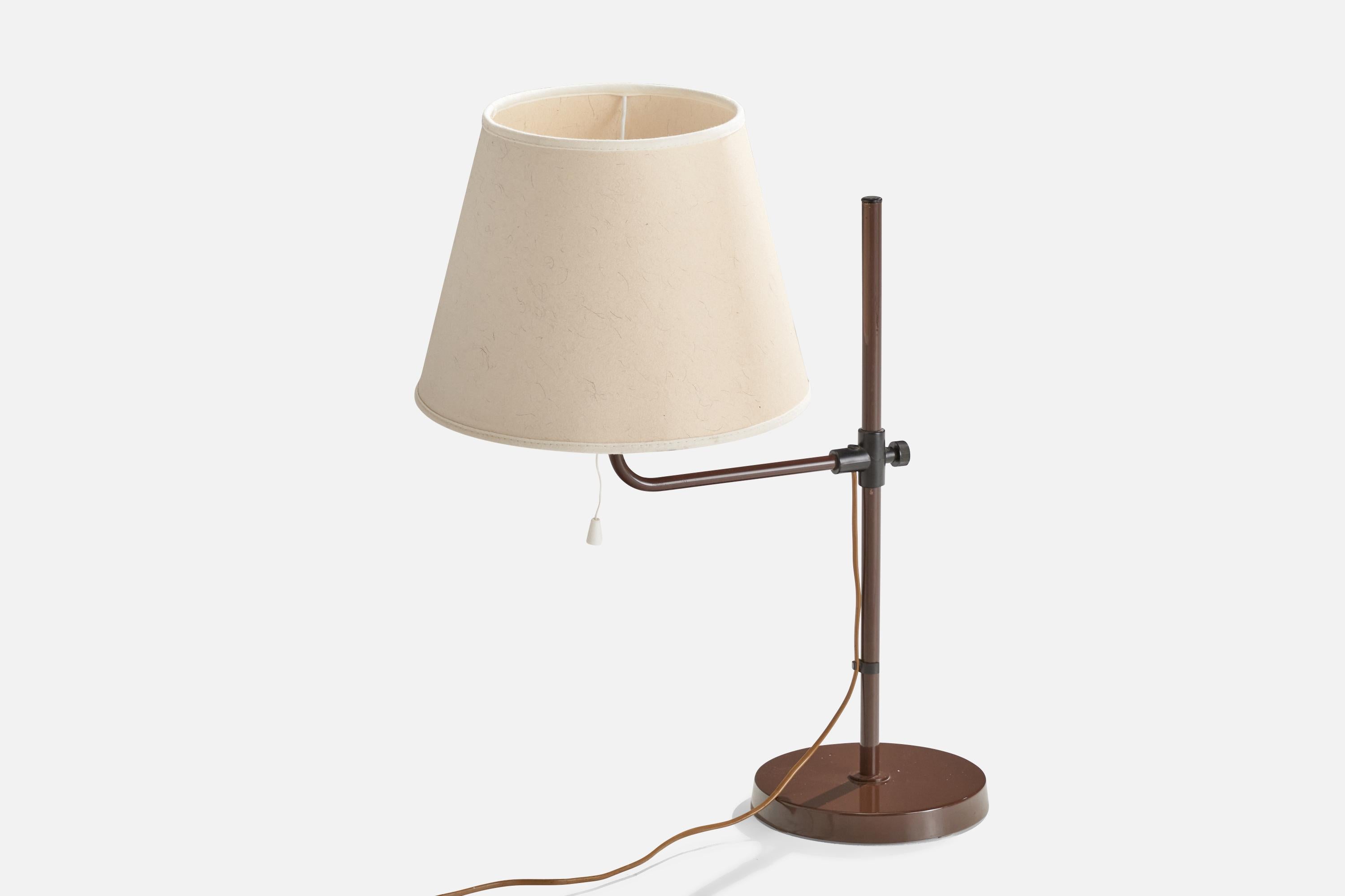 A brown-lacquered metal, plastic and white fabric table lamp produced by Bergboms, Sweden, c. 1970s.

Dimensions of Lamp (inches): 19.5” H x 7.5”  Diameter
Dimensions of Shade (inches): 7.5”  Top Diameter x 12” Bottom Diameter x 9” H
Dimensions of