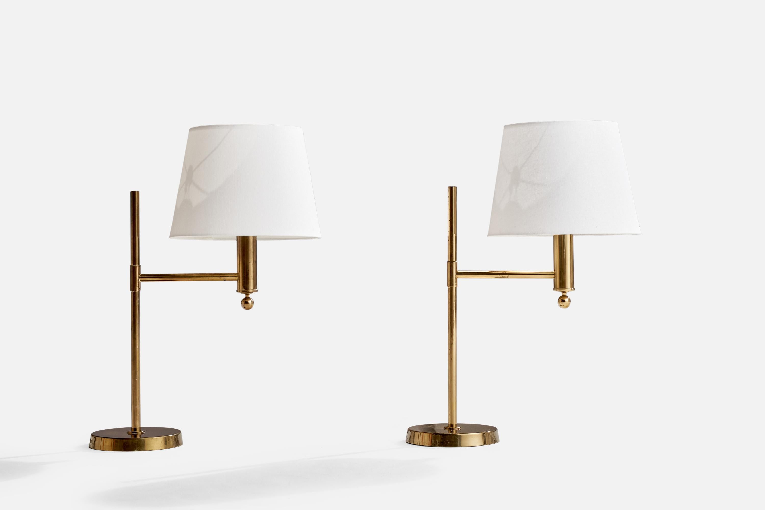 A pair of brass table lamps designed and produced by Bergboms, Sweden, c. 1970s.

Overall Dimensions (inches): 25”  H x 12”  W x 18” D
Stated dimensions include shade.
Bulb Specifications: E-26 Bulb
Number of Sockets: 2
All lighting will be