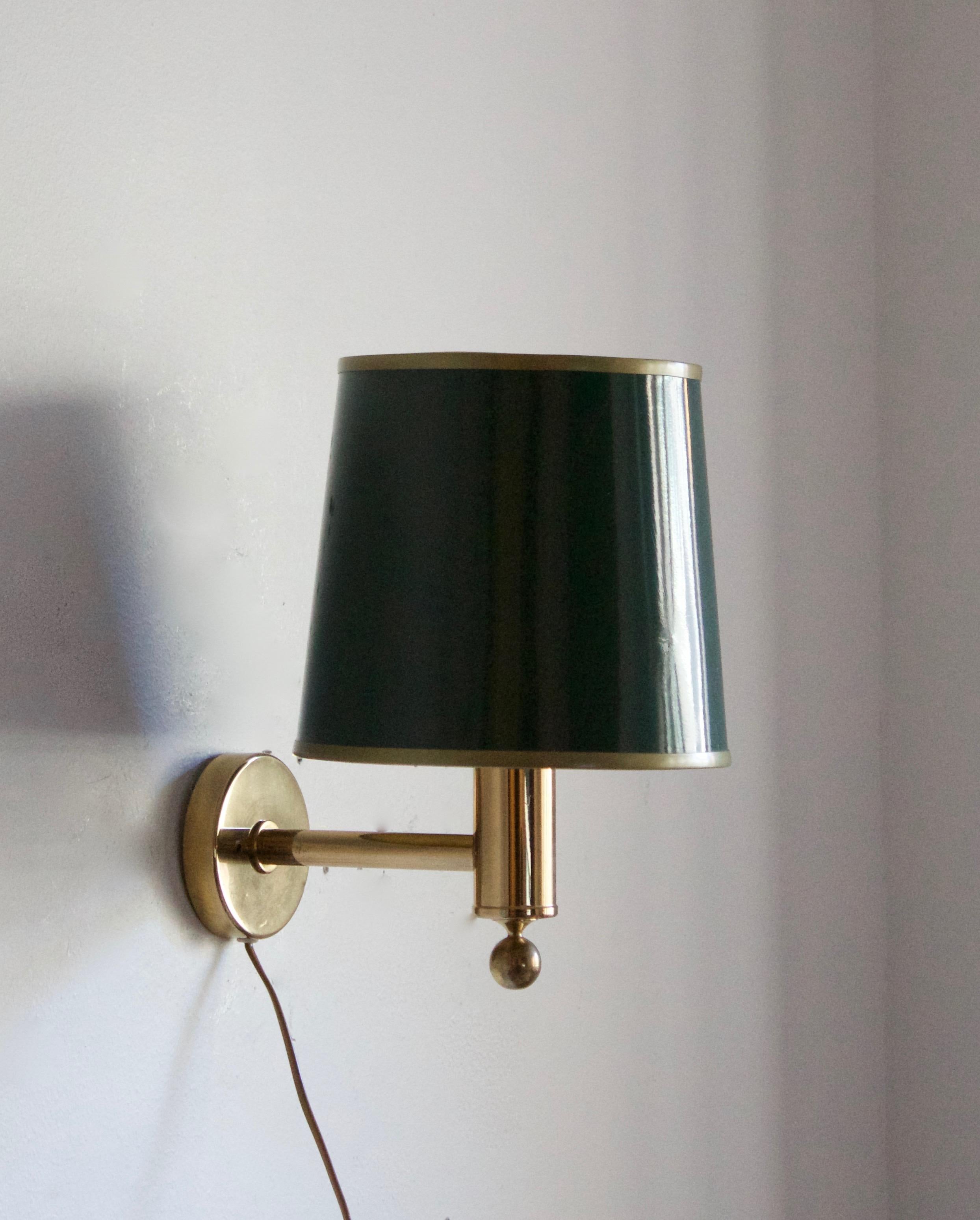 A wall light. Designed and produced by Bergboms, Sweden, circa 1970s. With its original lampshade.

Other designers of the period include Paavo Tynell, Hans Bergström, Josef Frank, and Kaare Klint.
