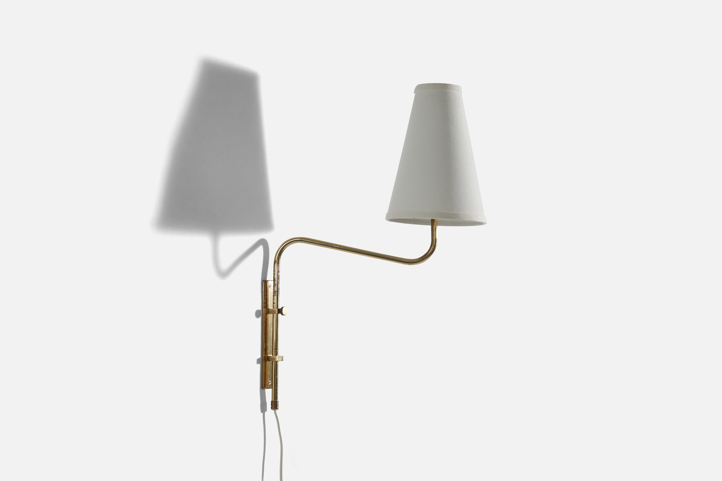A pair of brass and fabric wall lights designed and produced by Bergboms, Sweden, c. 1970s. 

Sold with lampshades. 
Stated dimensions refer to the Sconce with the Shade.
 