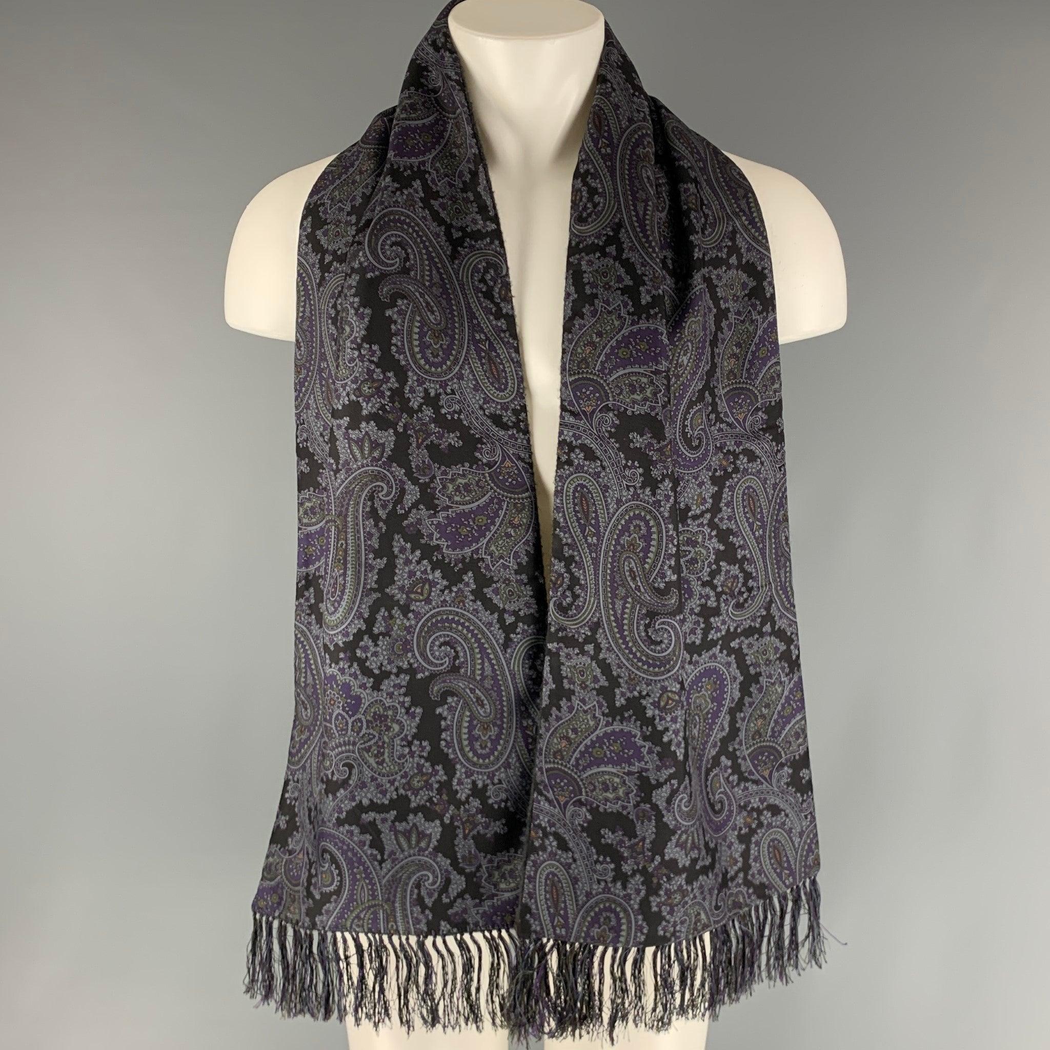 BERGDORF GOODMAN scarf comes in a black, grey and purple paisley cashmere and silk featuring a reversible design and a fringe trim. Made in at Britainches Excellent Pre-Owned Condition. 

Measurements: 
   68 inches  x 12 inches  
  
  
 
Reference: